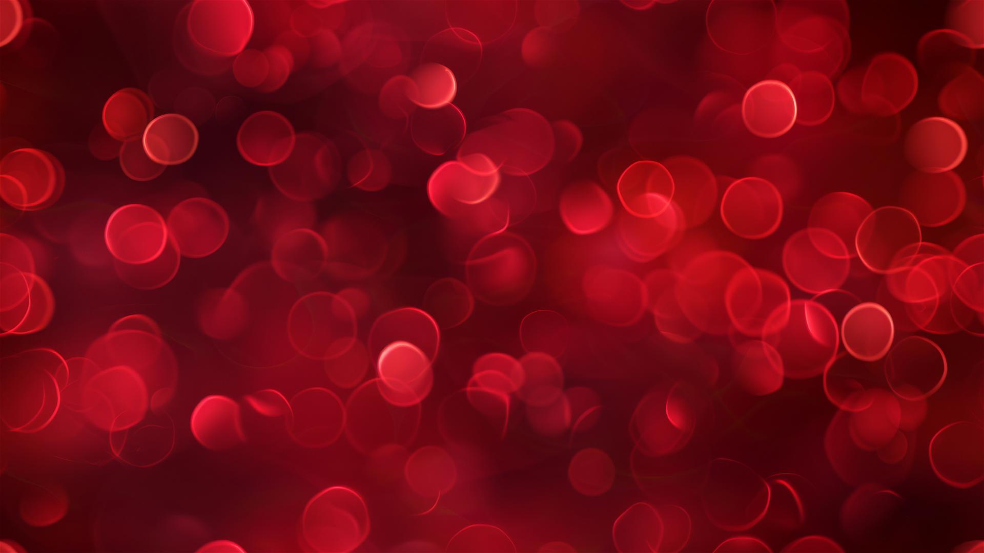 Bokeh red Christmas lights blurred background with polka dots, in the style of Catherine Hyde and Daniel Garber