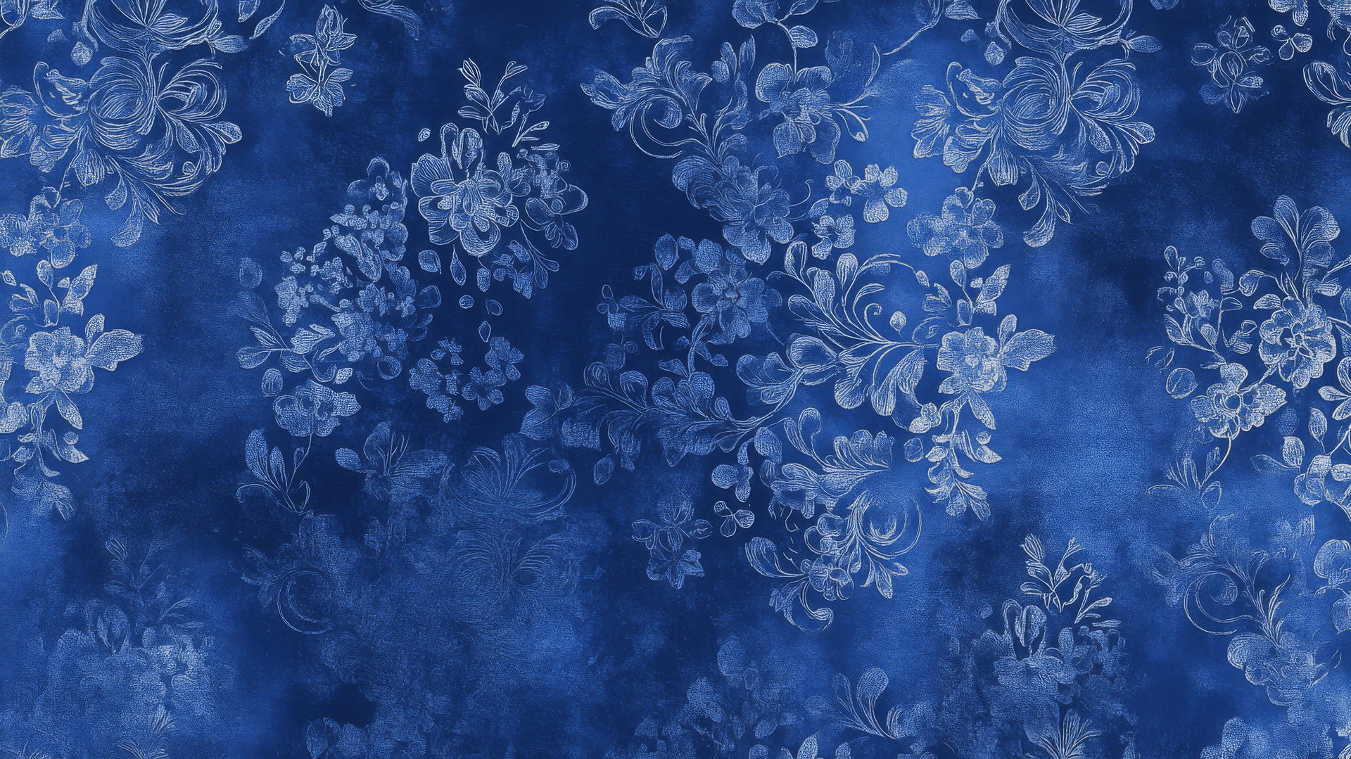 Royal blue wallpaper with intricate lace floral pattern