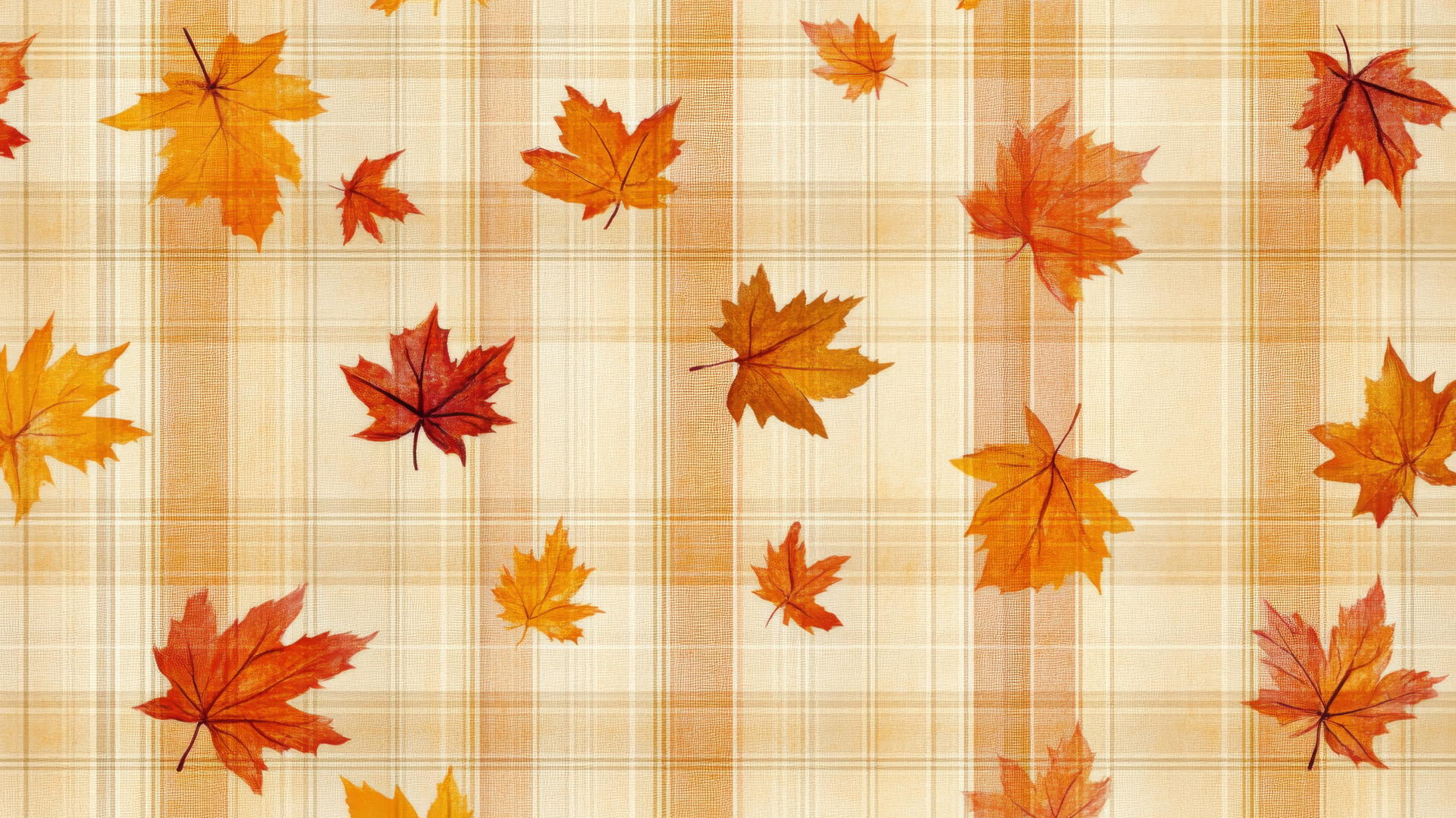 preppy fall wallpaper with warm-toned plaid and autumn leaves
