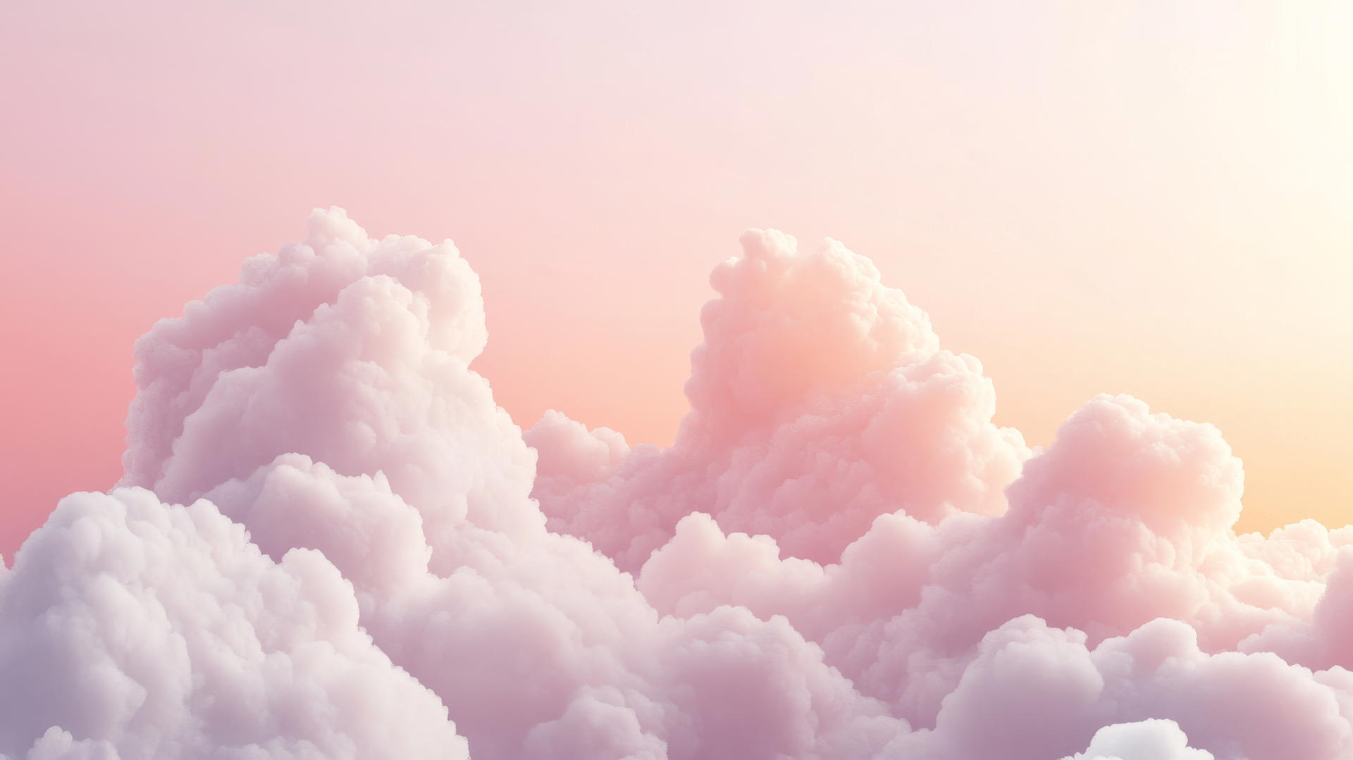 A dreamy light pink wallpaper with soft, fluffy clouds in a gradient sky.