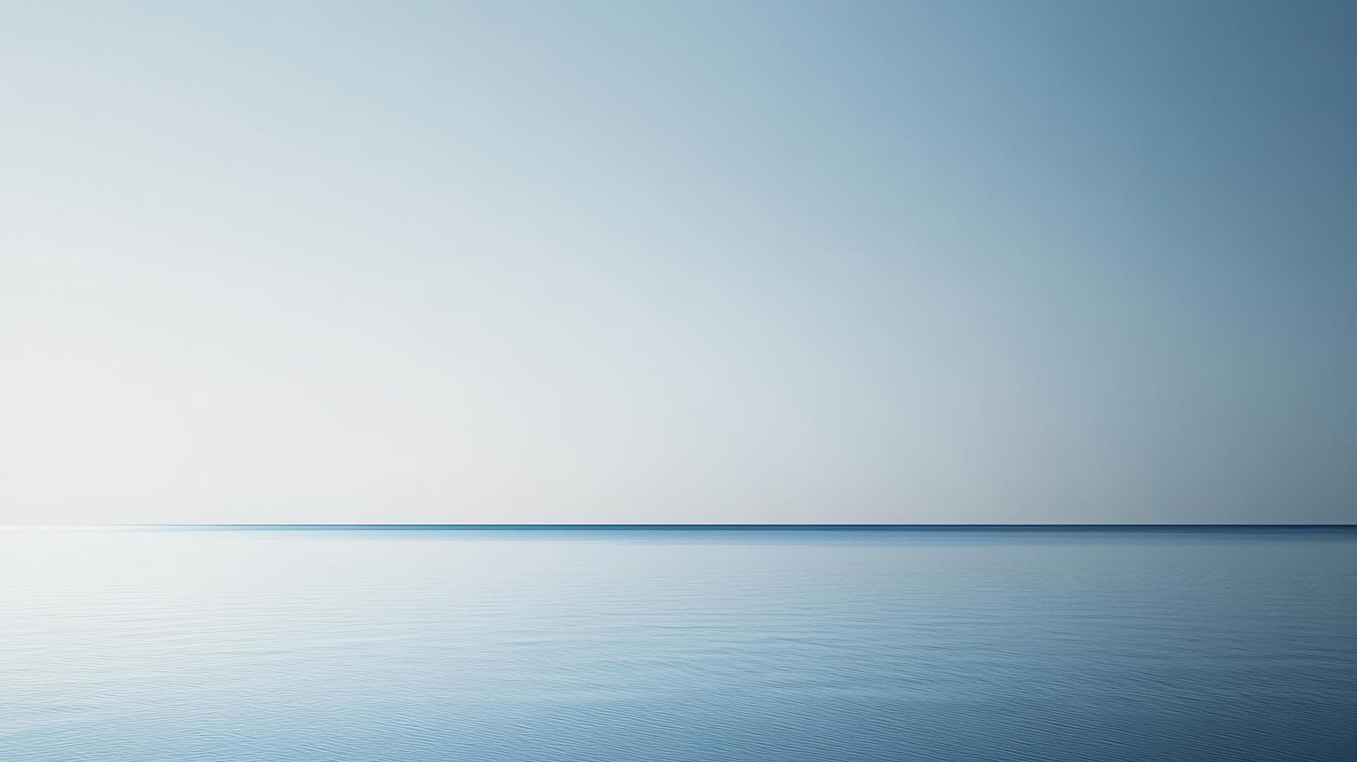 aesthetic blue wallpaper with minimalist design featuring a single blue horizon line against a pale blue sky