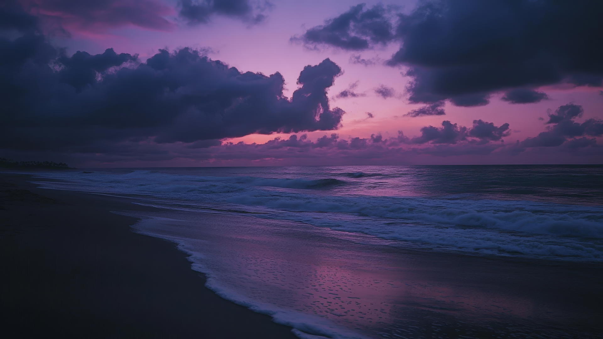 Beach aesthetic wallpaper with dark clouds, twilight sky in pinks and purples, and gentle waves.