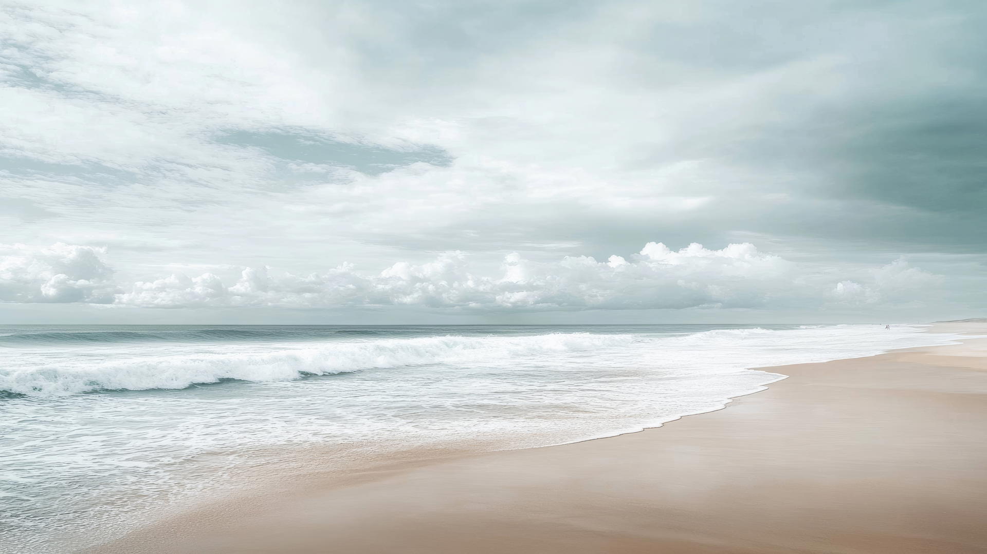 Minimalist beach wallpaper aesthetic with smooth sand, gentle waves, and cloudy sky