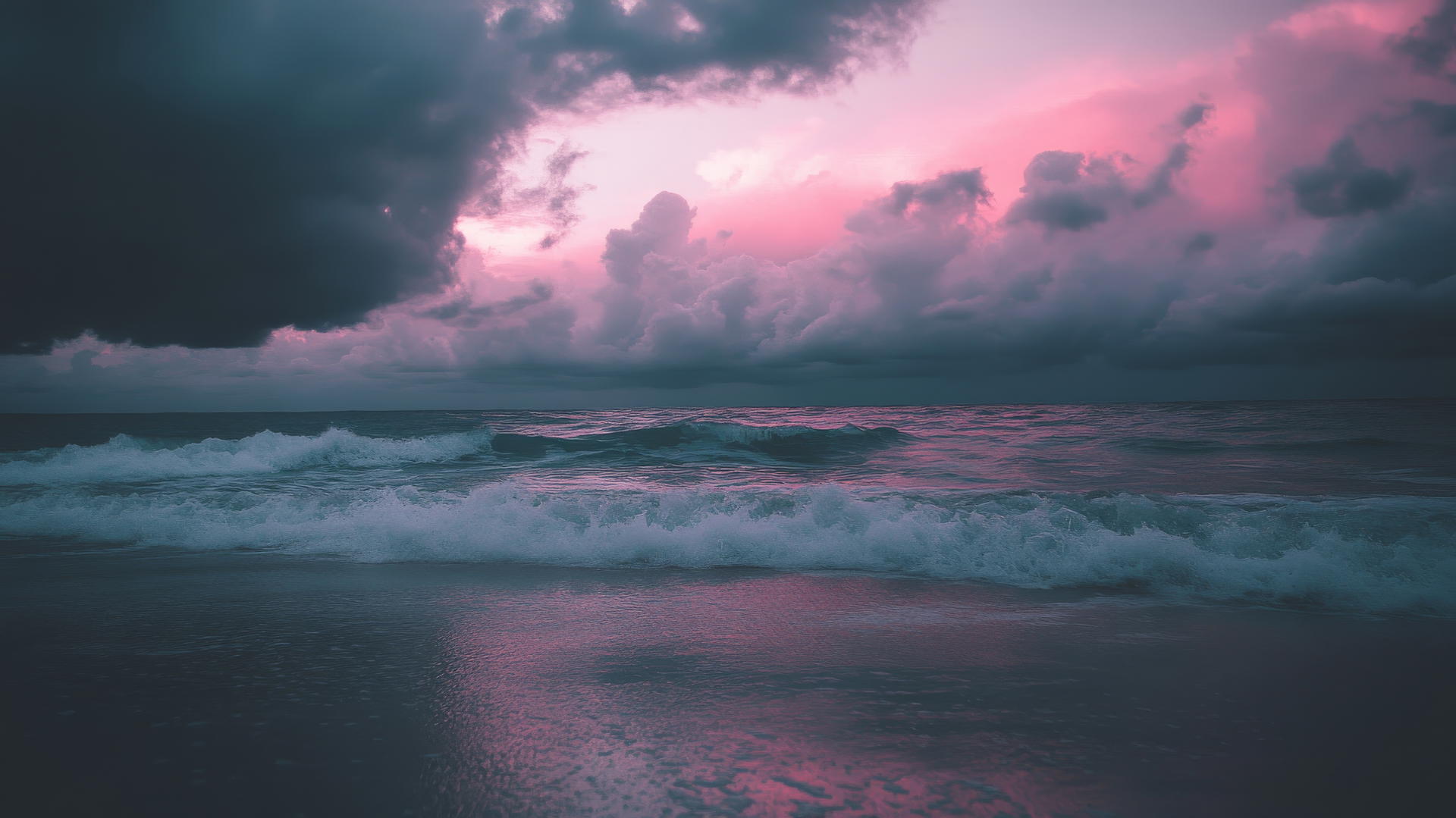 beach aesthetic wallpaper with dark clouds, soft pinks, and gentle waves
