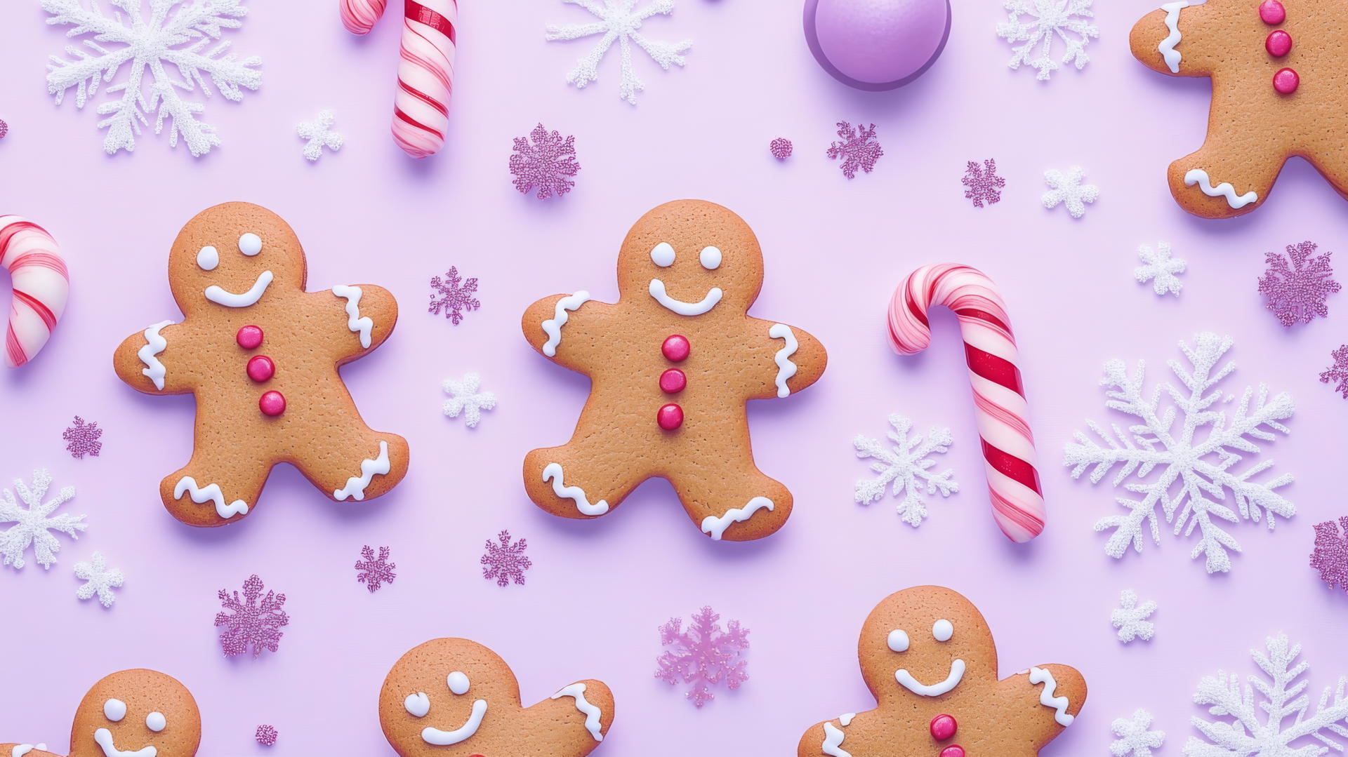 Preppy Christmas wallpaper featuring whimsical gingerbread men, candy canes, and snowflakes on pastel lavender.