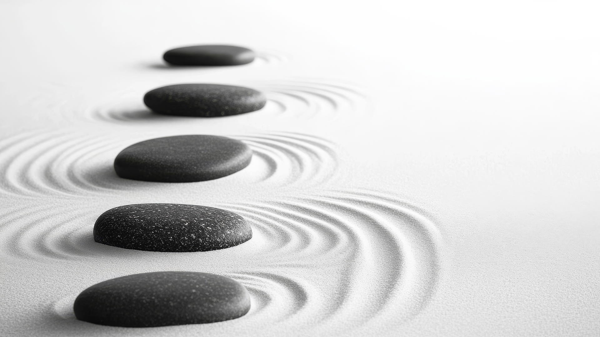 black and white aesthetic wallpaper of a zen garden with raked sand and stones