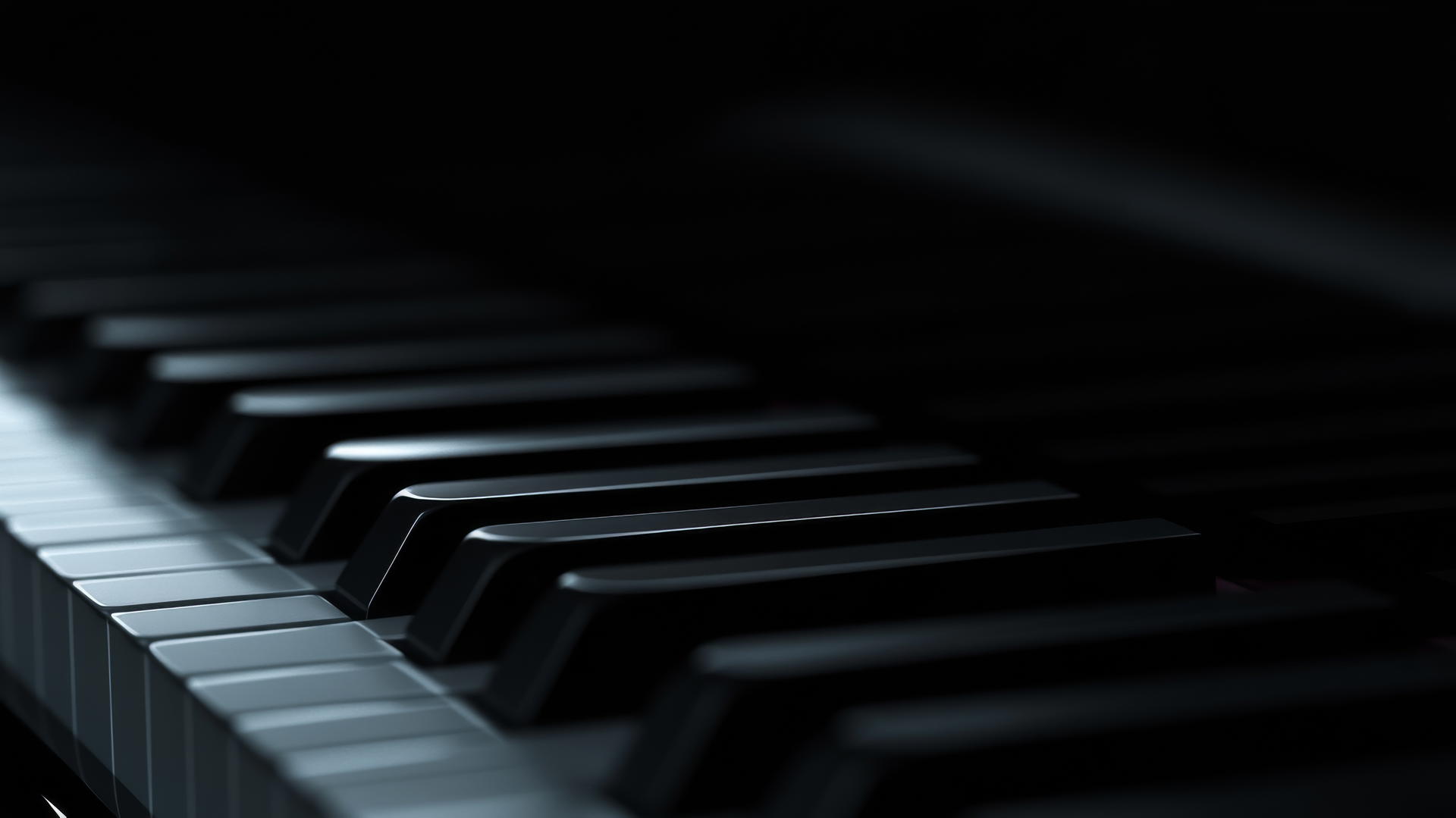 aesthetic black wallpaper of close-up black piano keys with soft lighting