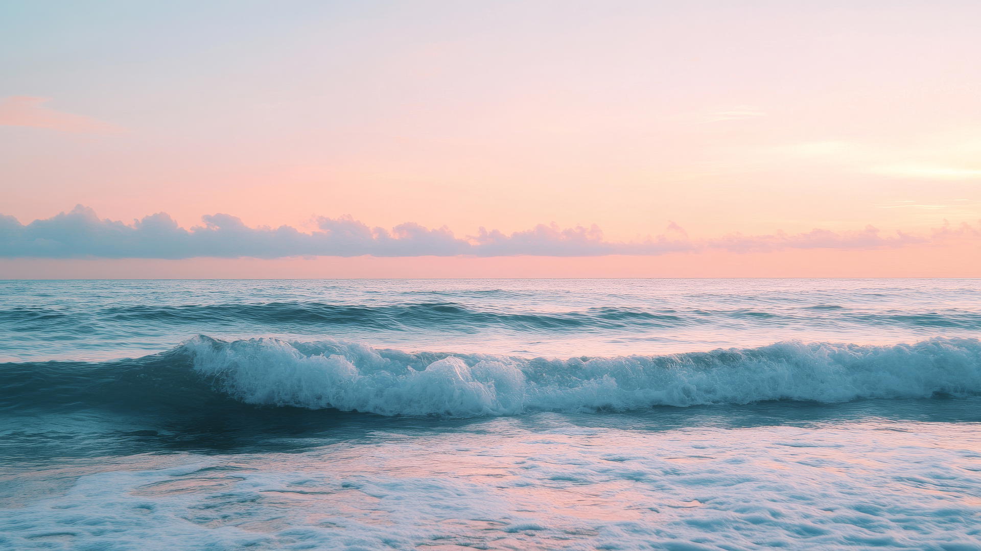 nature aesthetic wallpaper of calm ocean with gentle waves and pastel-colored sky at dusk