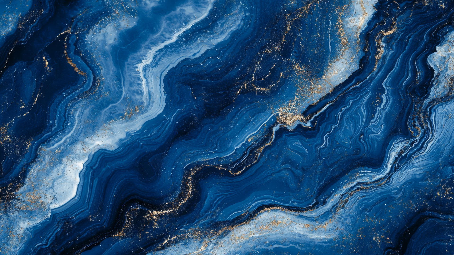 blue background wallpaper with fluid marble patterns in blue, white, and silver tones