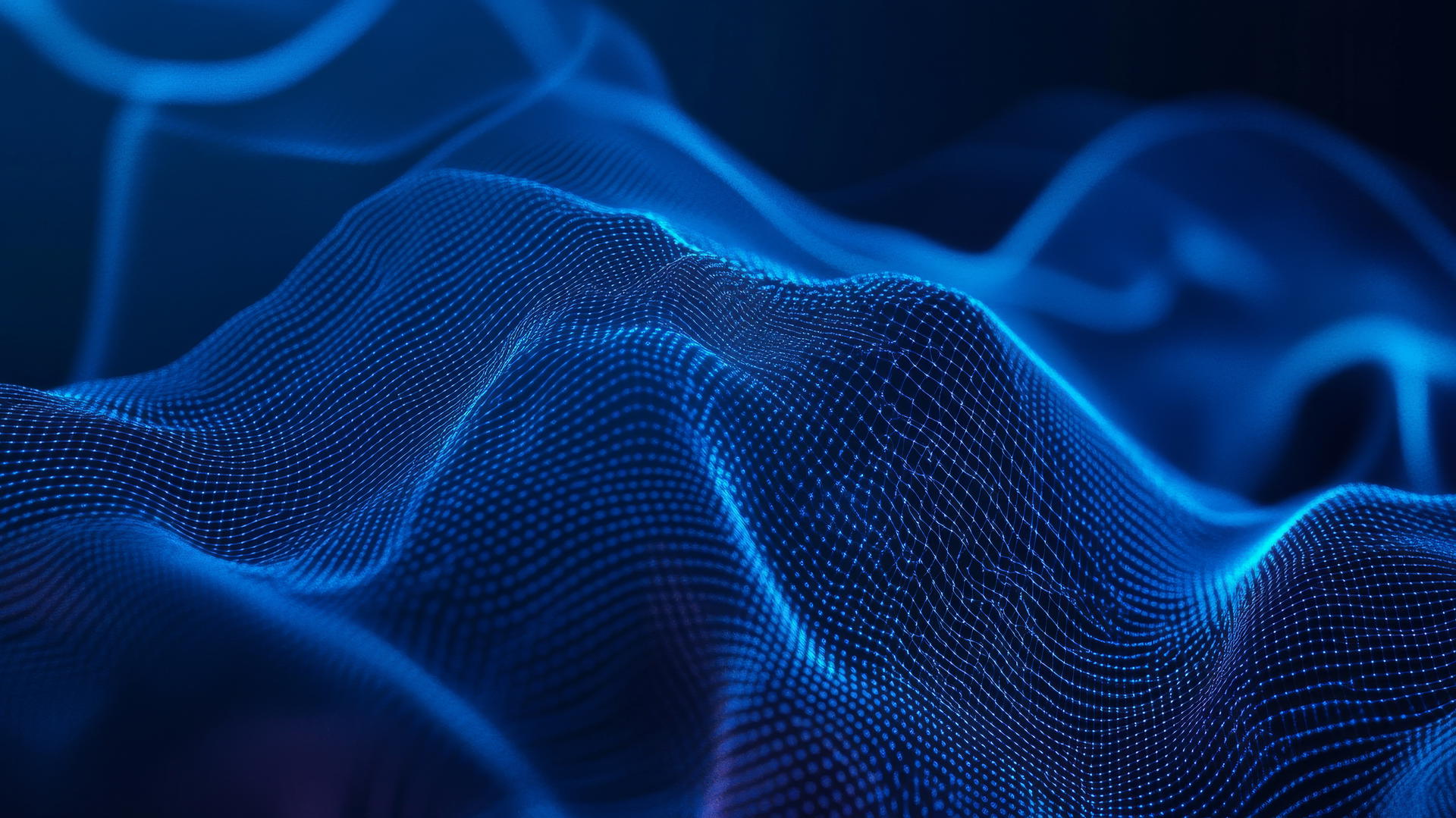 Blue background wallpaper with dynamic digital wave patterns.