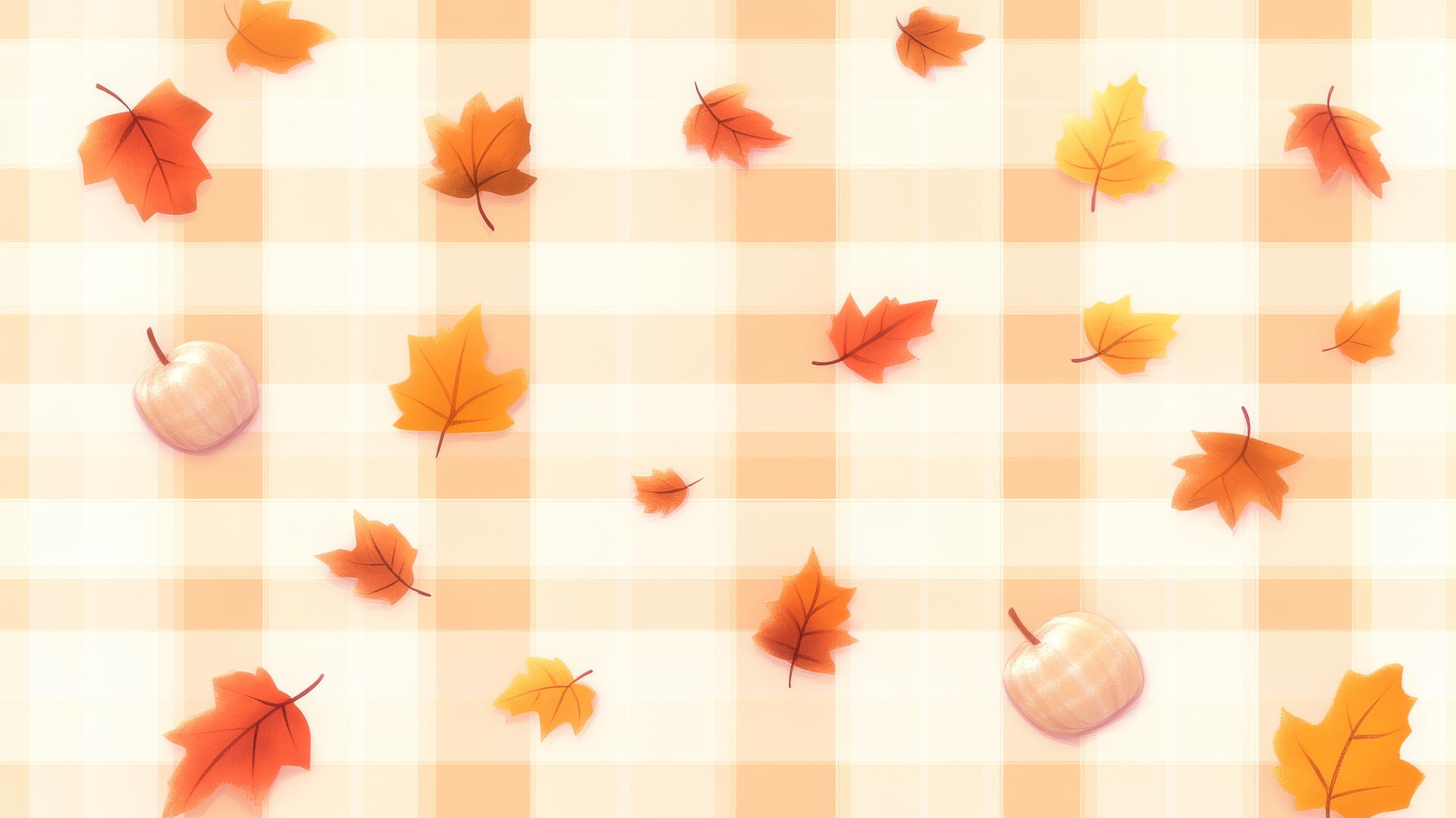 warm-toned plaid with scattered autumn leaves