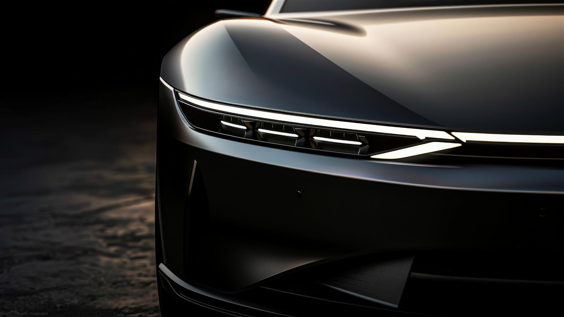 Close up of an electric coupe with a large headlight and thin LED strip.