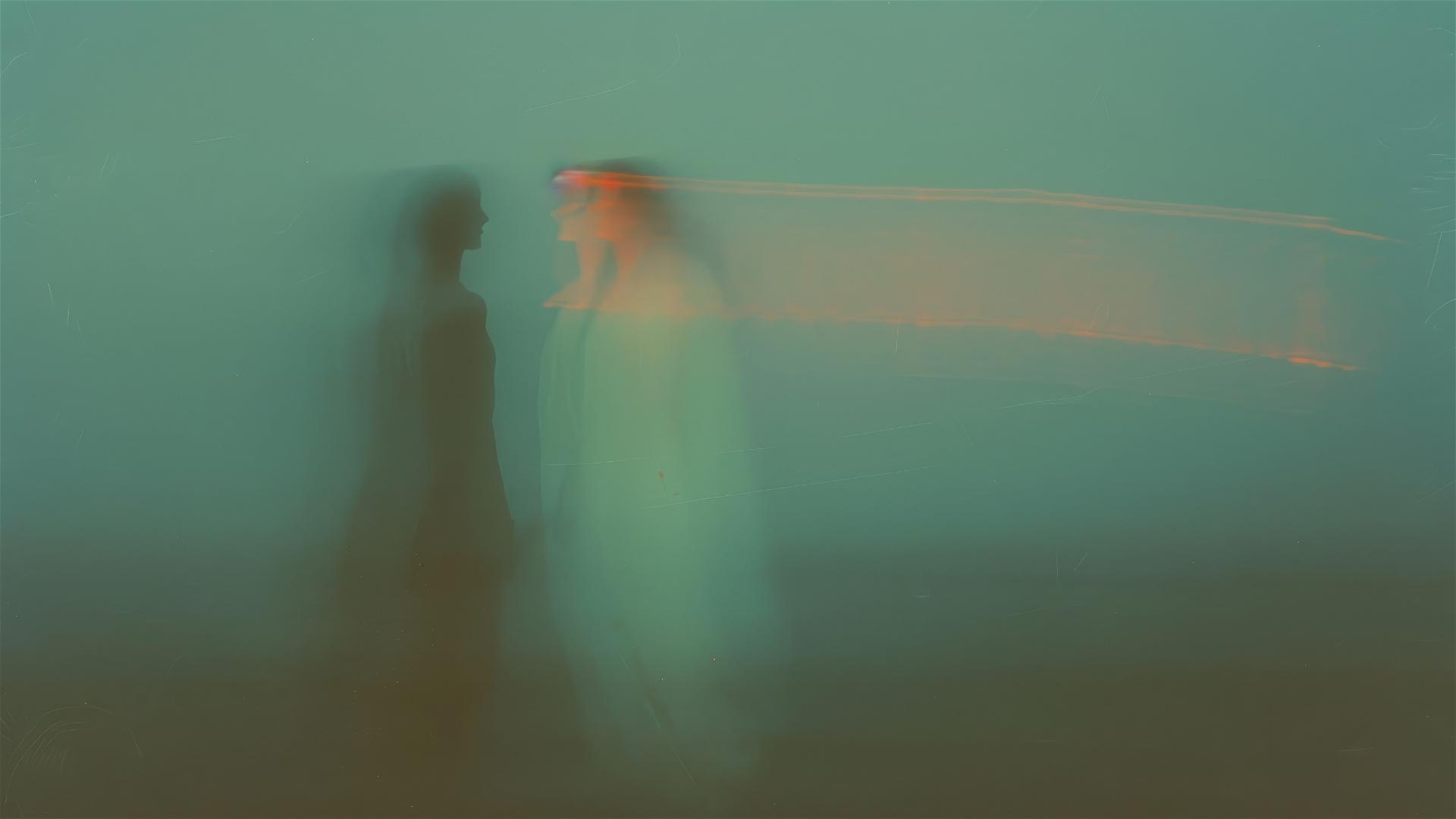 Two figures with ethereal light and neon shadows