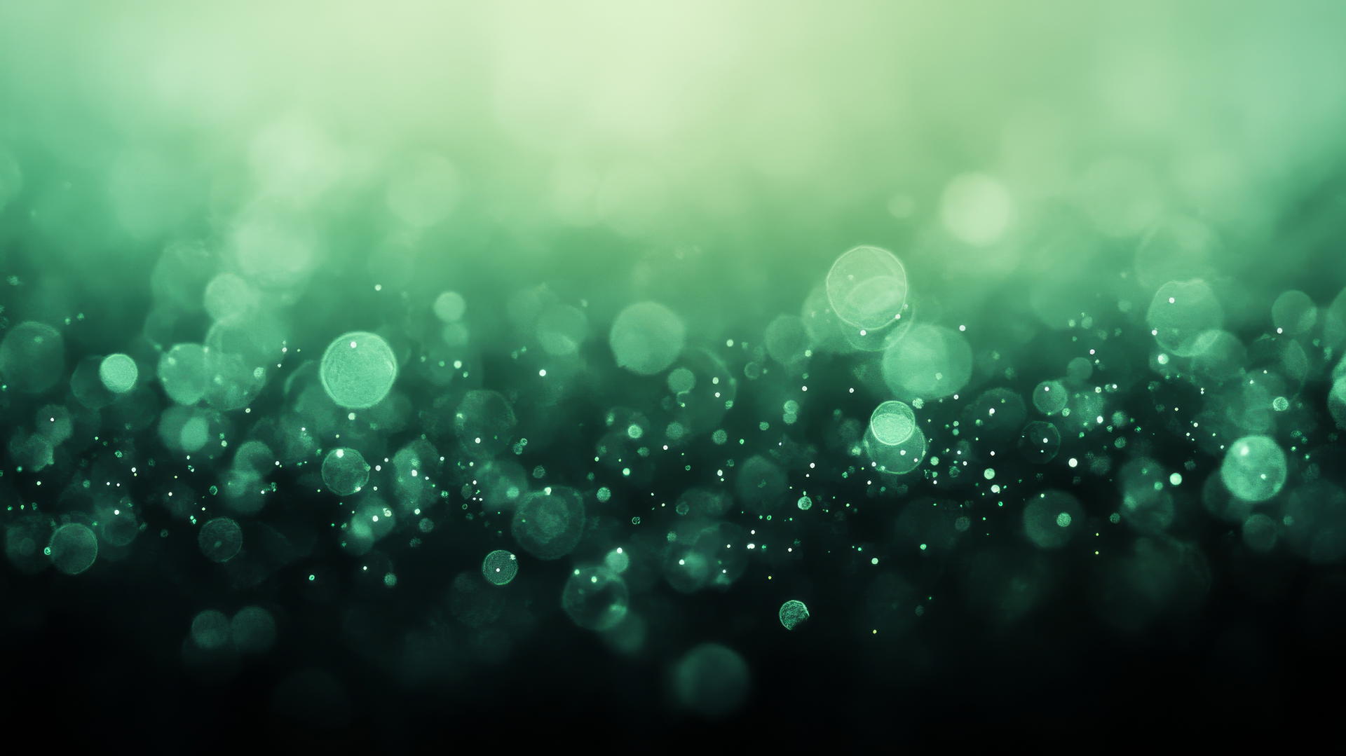 Calming emerald green wallpaper with gradient fade and subtle bokeh effects