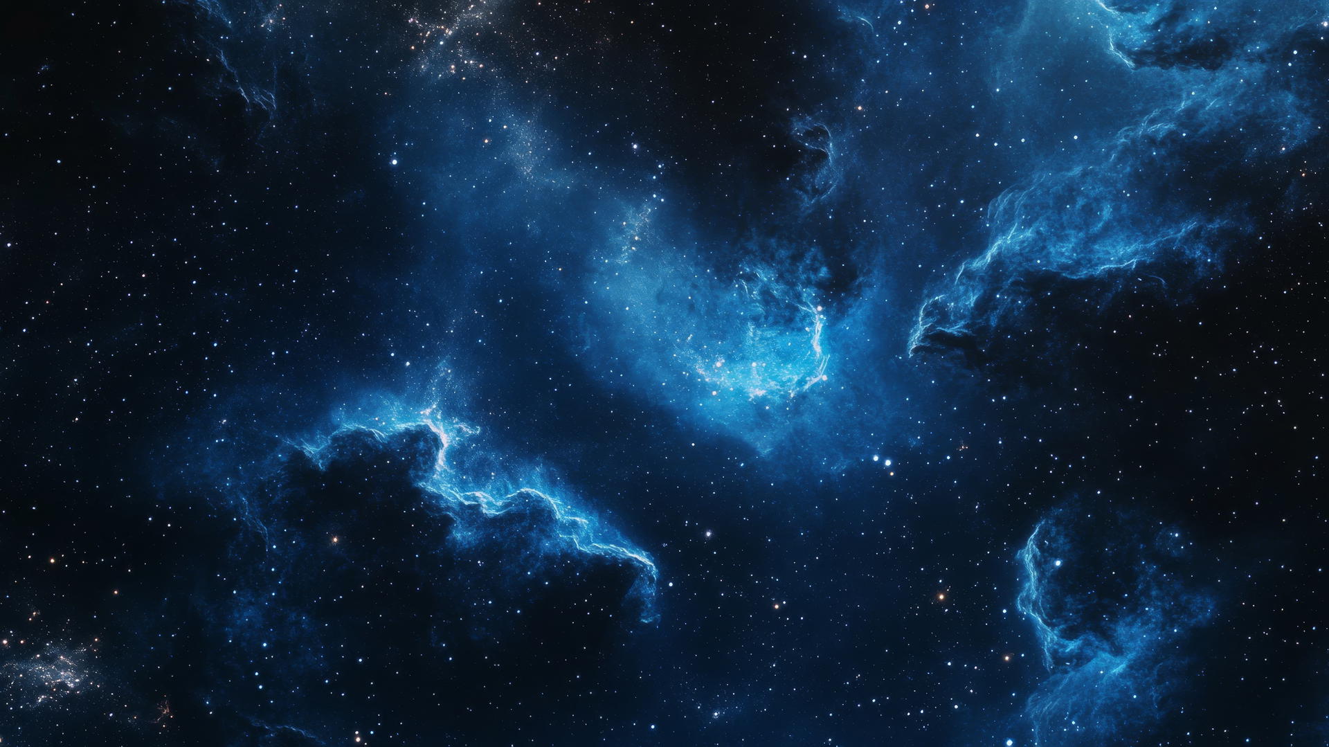 Black and blue wallpaper featuring a cosmic nebula in space with stars.