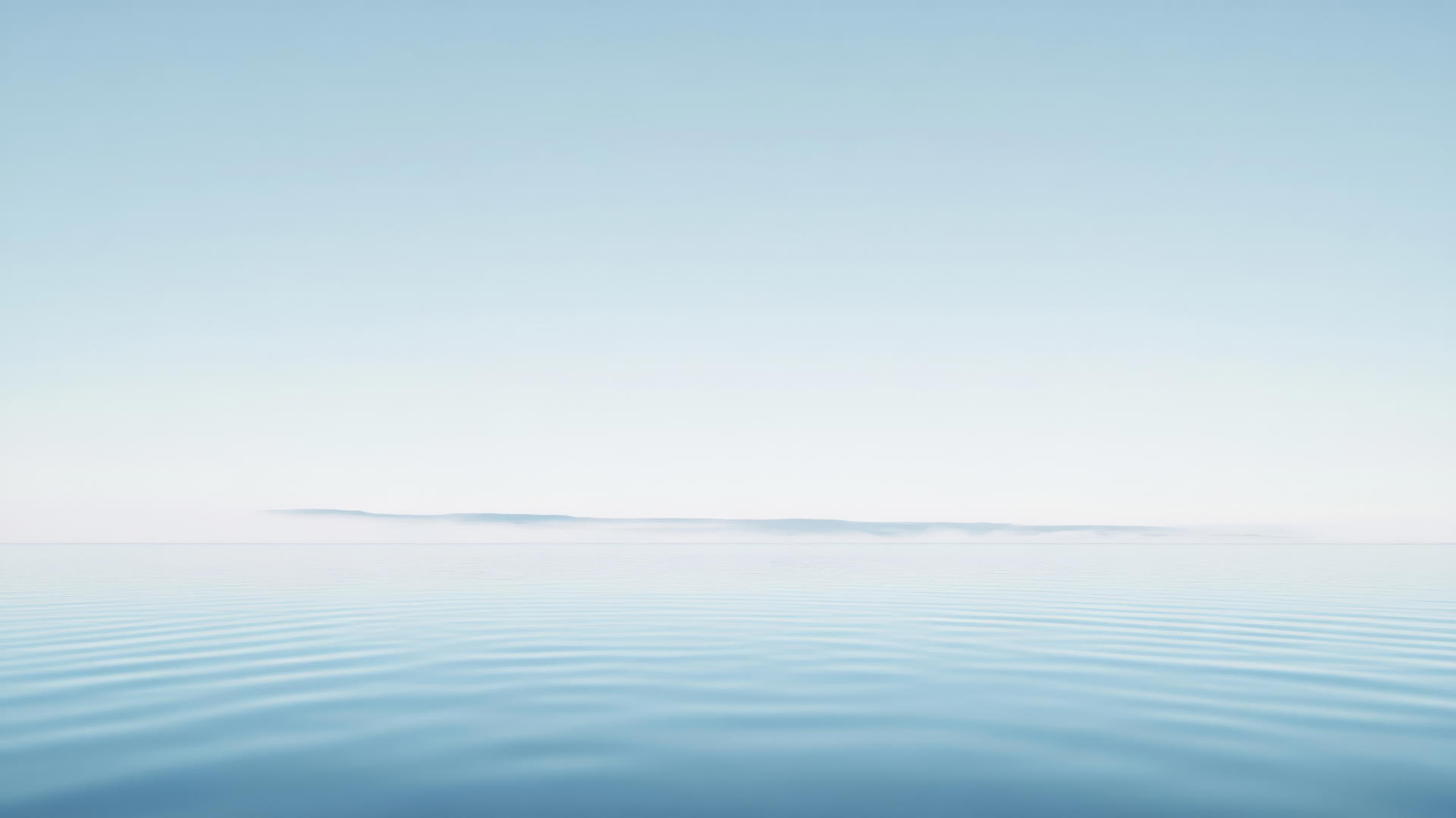 Aesthetic blue wallpaper with a minimalist blue horizon line against a pale blue sky.
