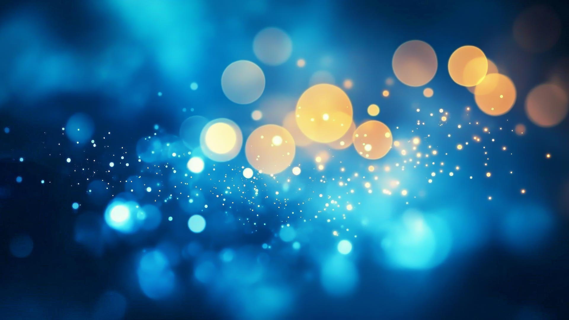 Aesthetic wallpaper blue with soft blue bokeh light effect and blurred circles against a deep blue background.