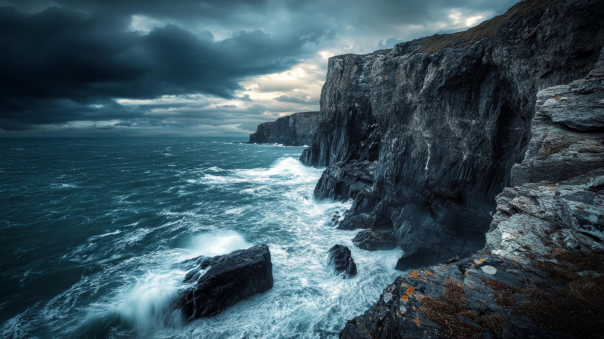 dramaic cliffside with crashing waves and stormy sky, nature wallpaper