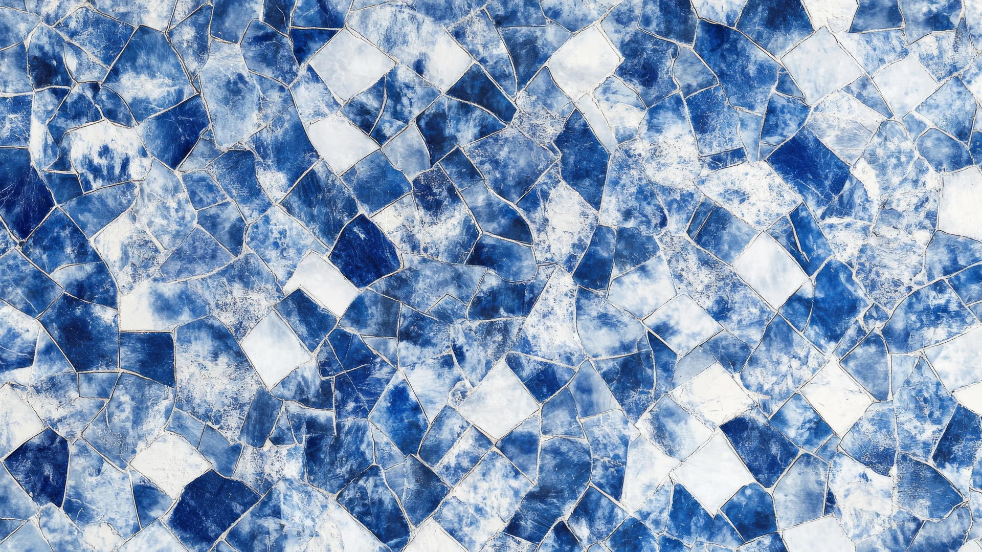 blue and white wallpaper with unique mosaic tile patterns