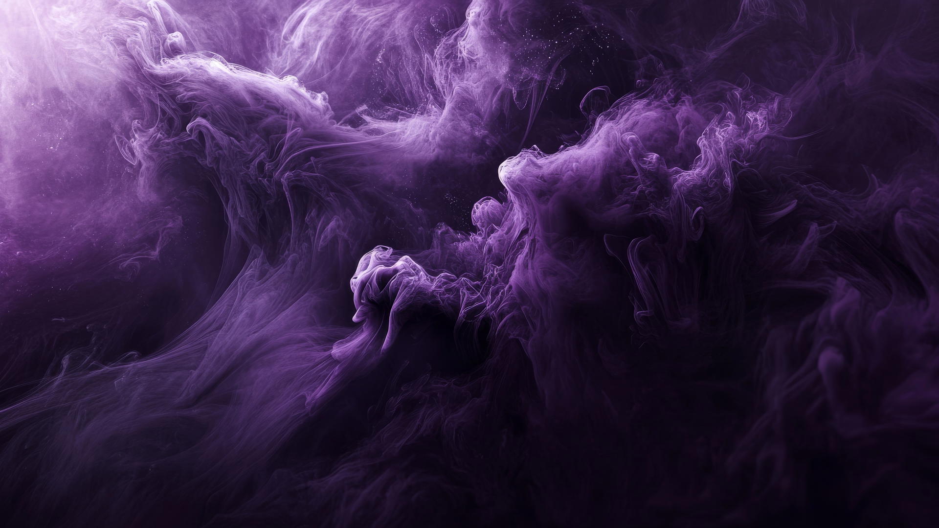dark purple wallpaper with ink swirling in water creating dreamy patterns