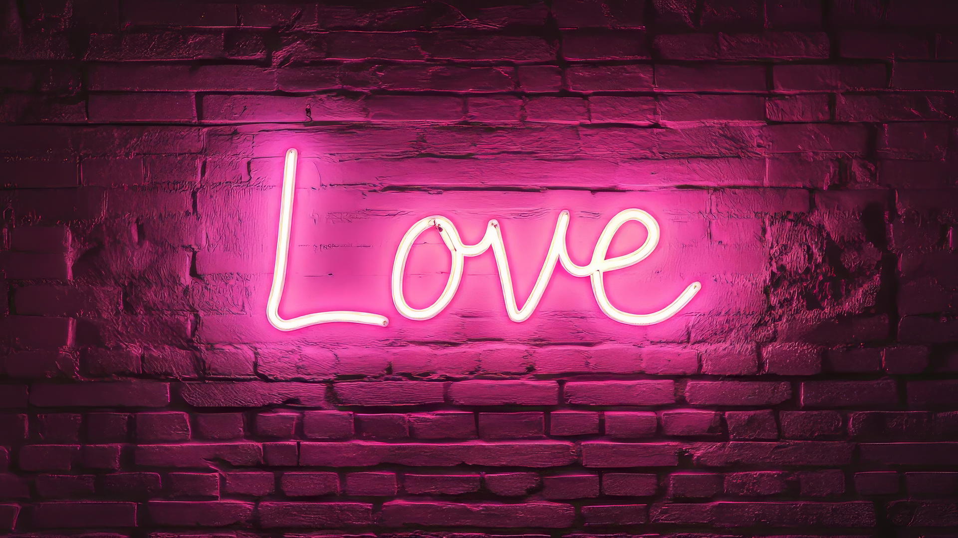 neon sign with 'Love' in cursive on dark pink brick wall, pink aesthetic wallpaper
