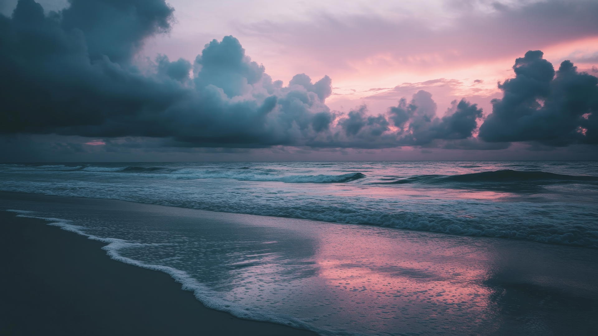 moody beach aesthetic wallpaper with dark clouds, pink and purple sky, and gentle waves
