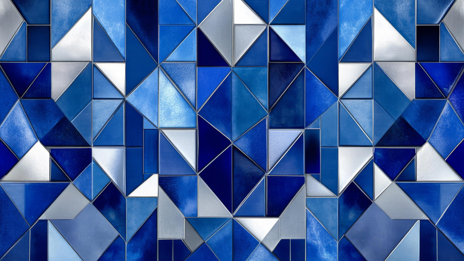 mosaic of geometric tiles in royal blue with silver accents