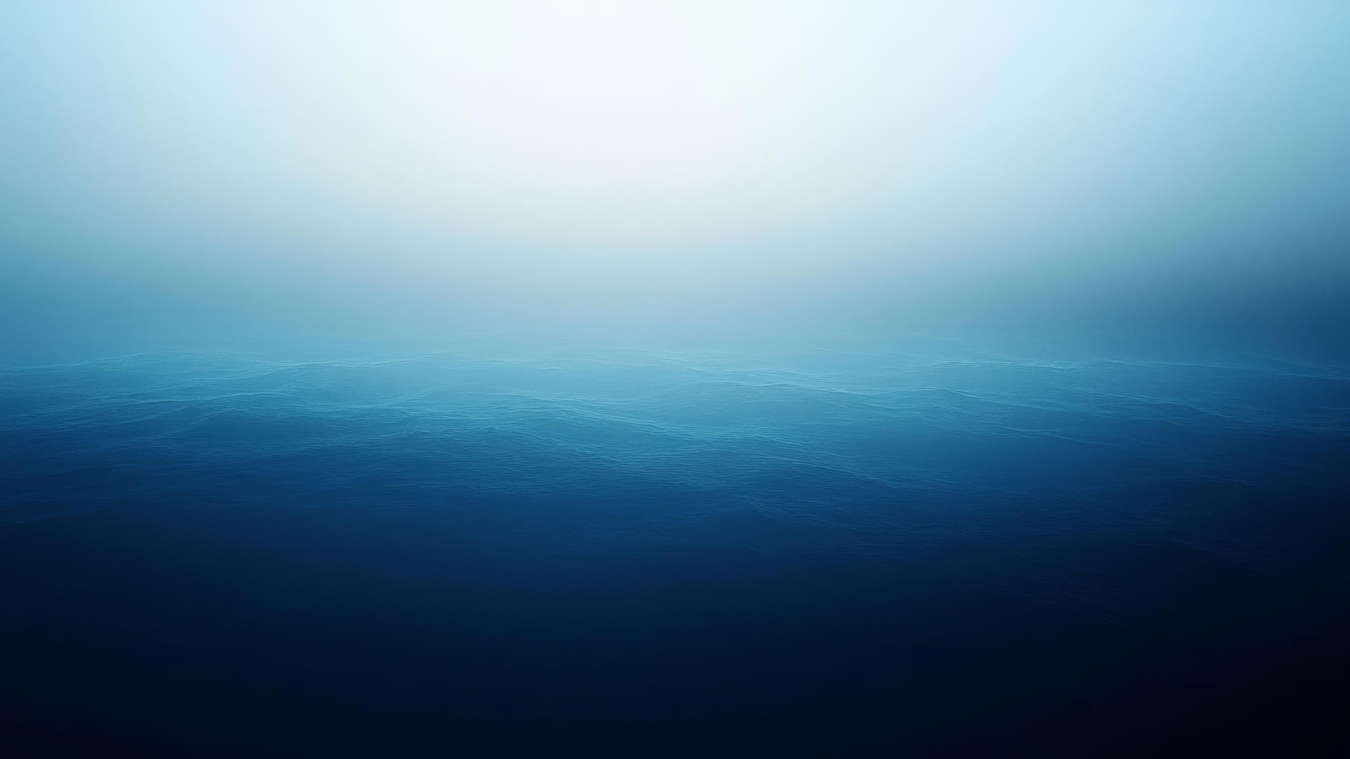blue wallpaper with smooth gradient from dark navy to light sky blue