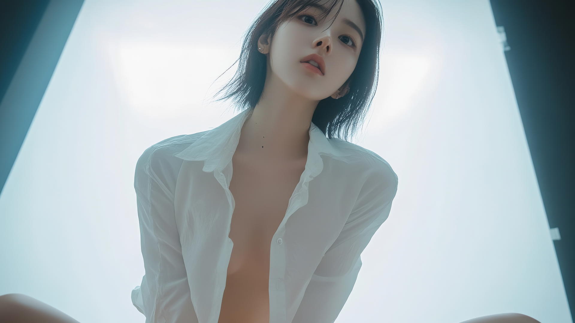 Korean pop star in white office shirt kneels, looking down, warm light, apartment ceiling.