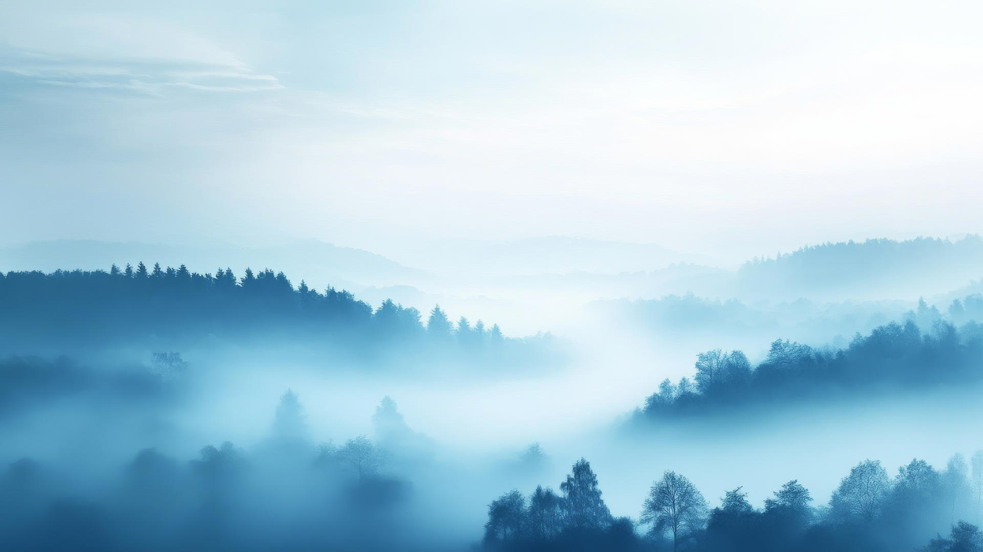 blue wallpaper aesthetic with misty hills and distant trees