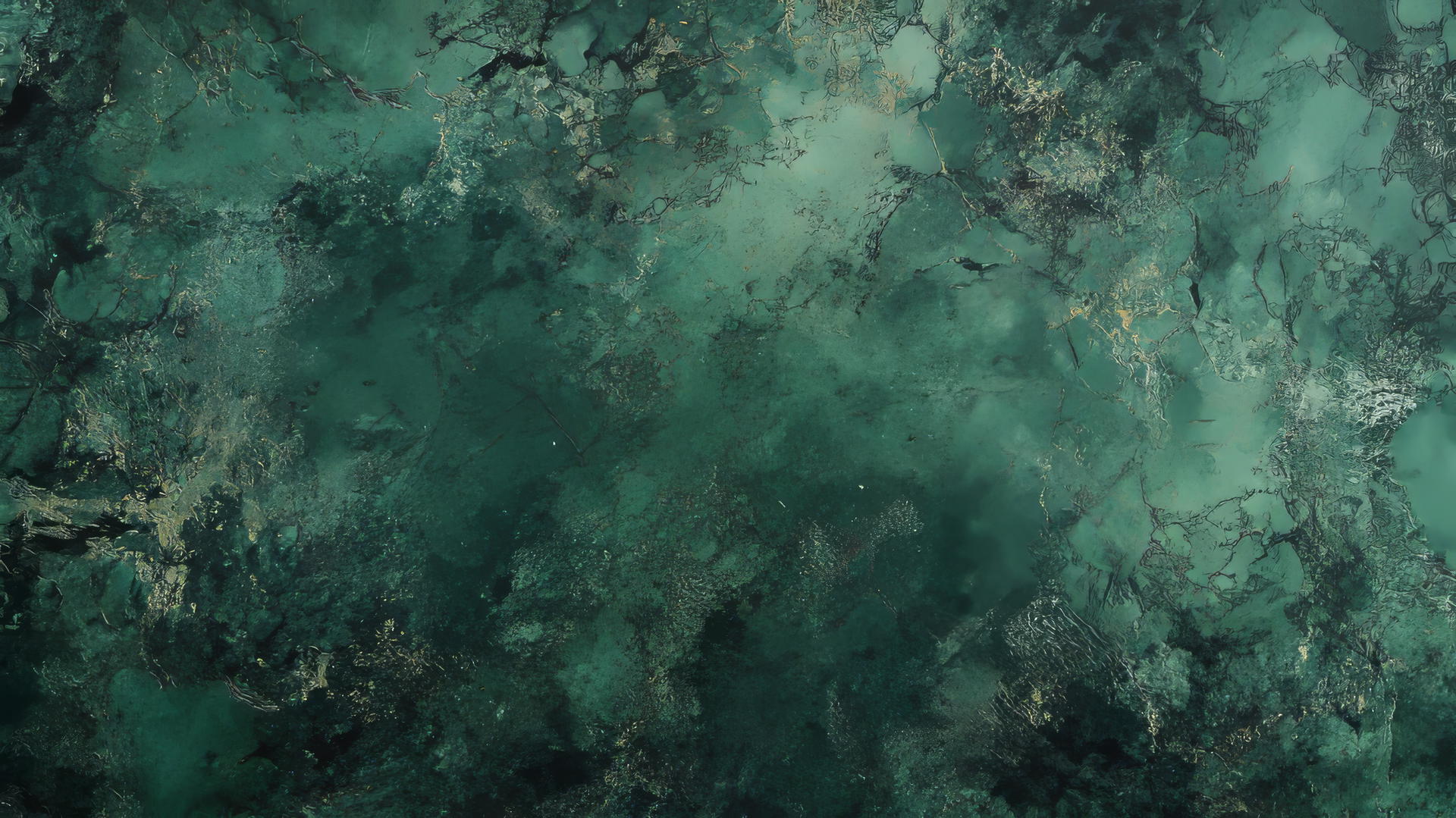 dark green wallpaper with hints of emerald and black, resembling aged marble
