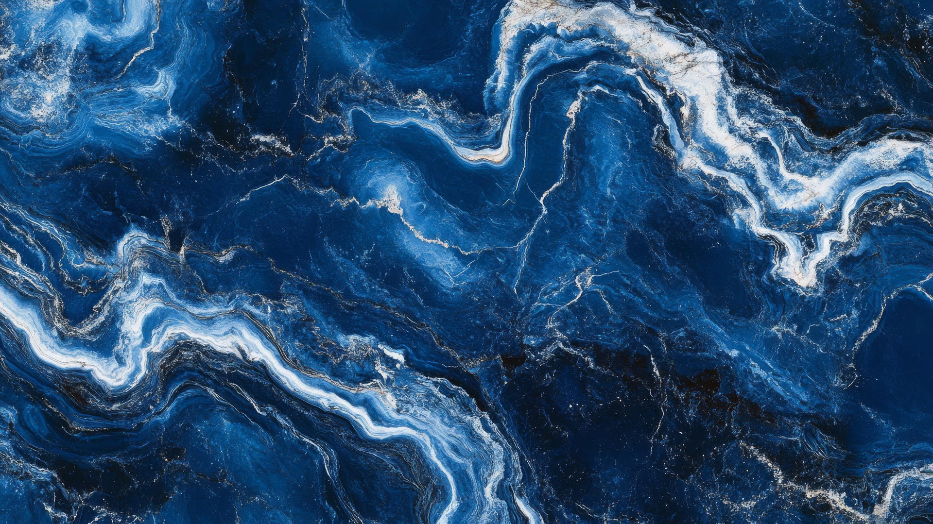 royal blue wallpaper with luxurious blue marble texture and white veins