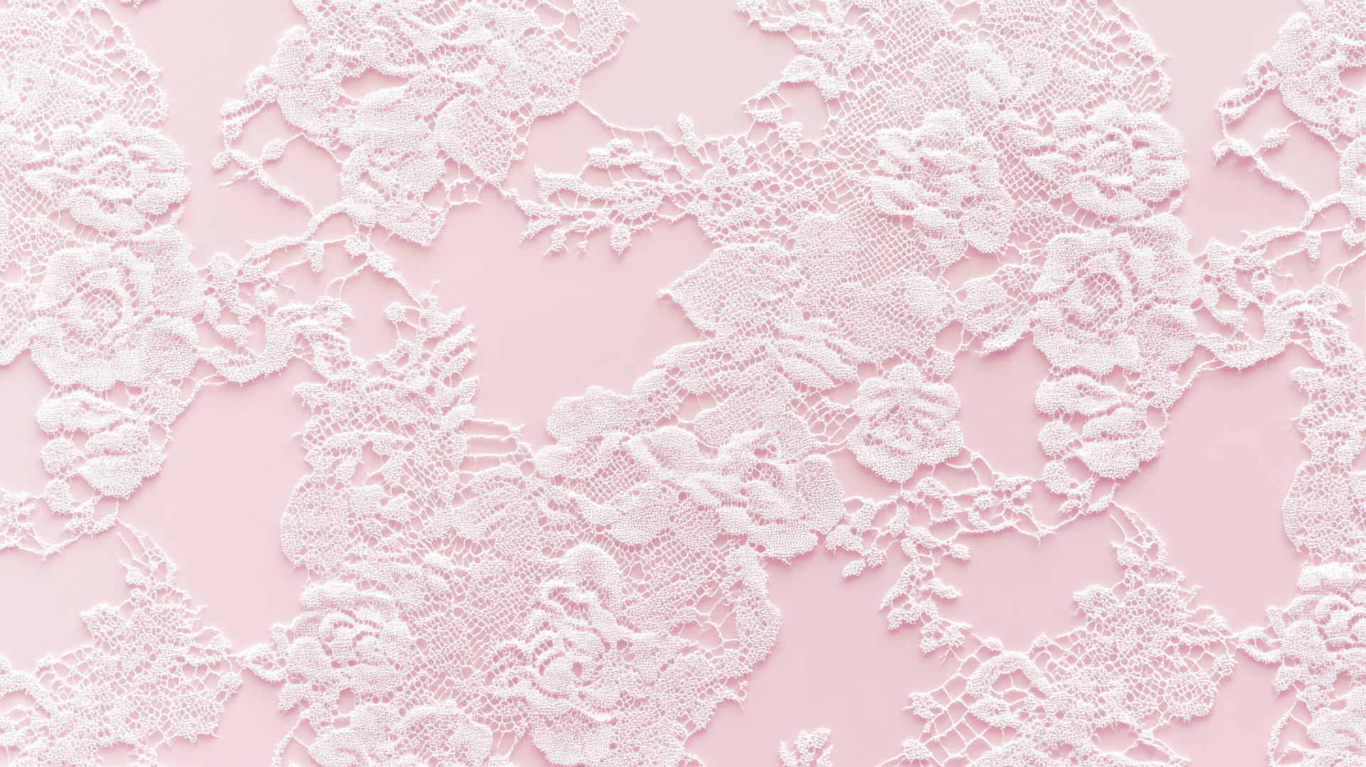 Aesthetic pink wallpaper with delicate lace pattern overlay.