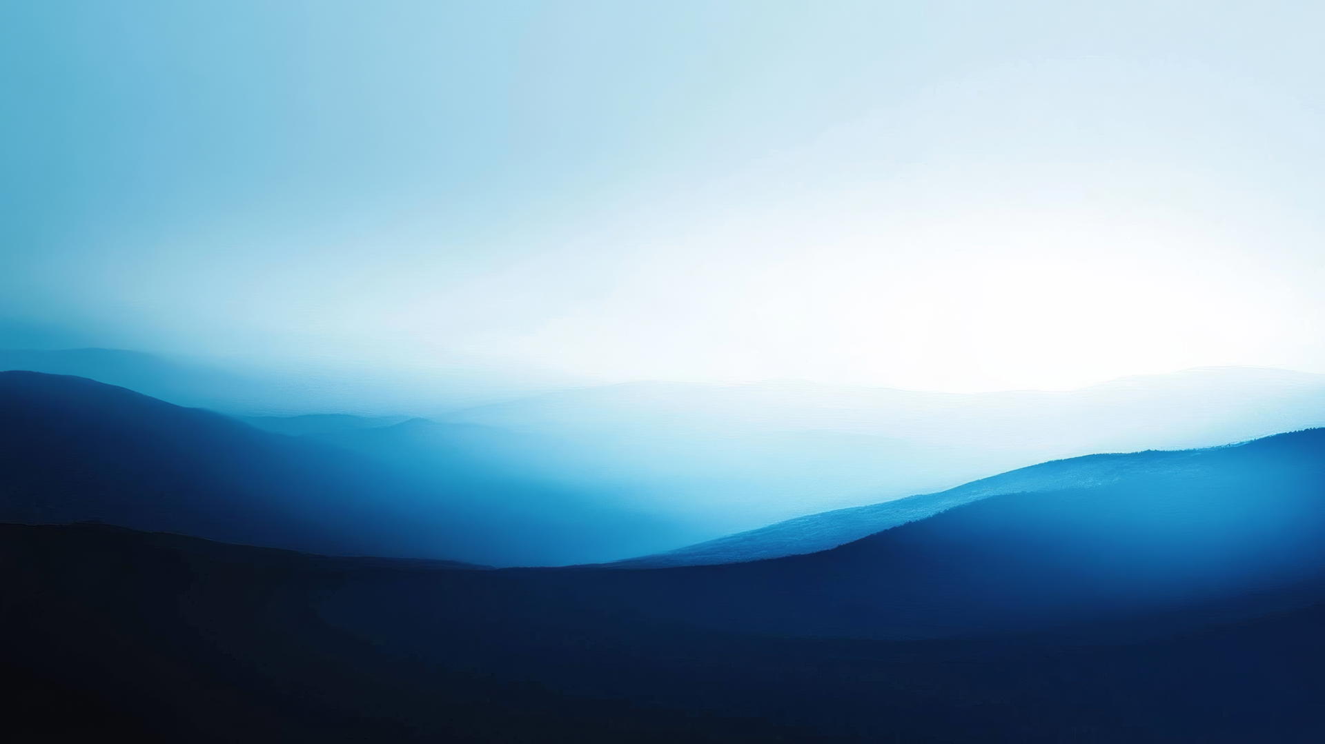 blue wallpaper with a smooth gradient from dark navy blue to light sky blue