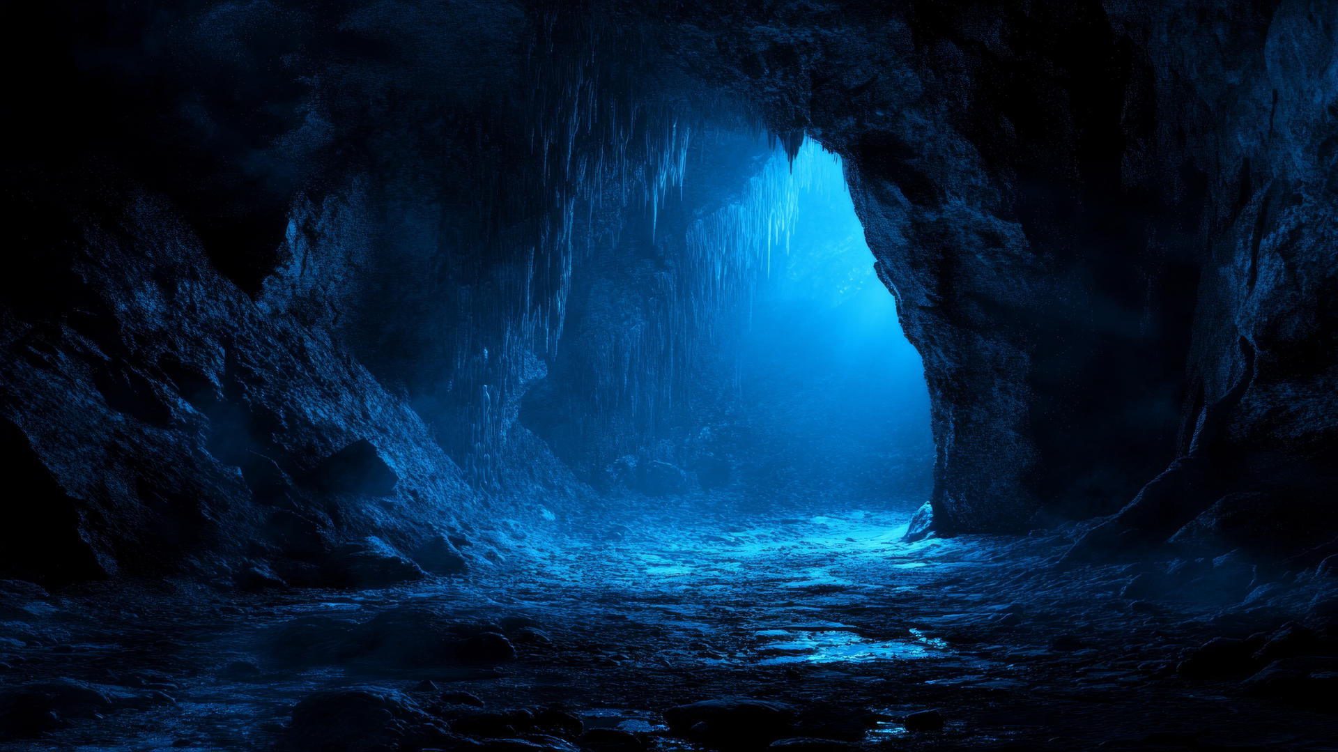 dark blue wallpaper of a mysterious cave entrance with an illuminating glow