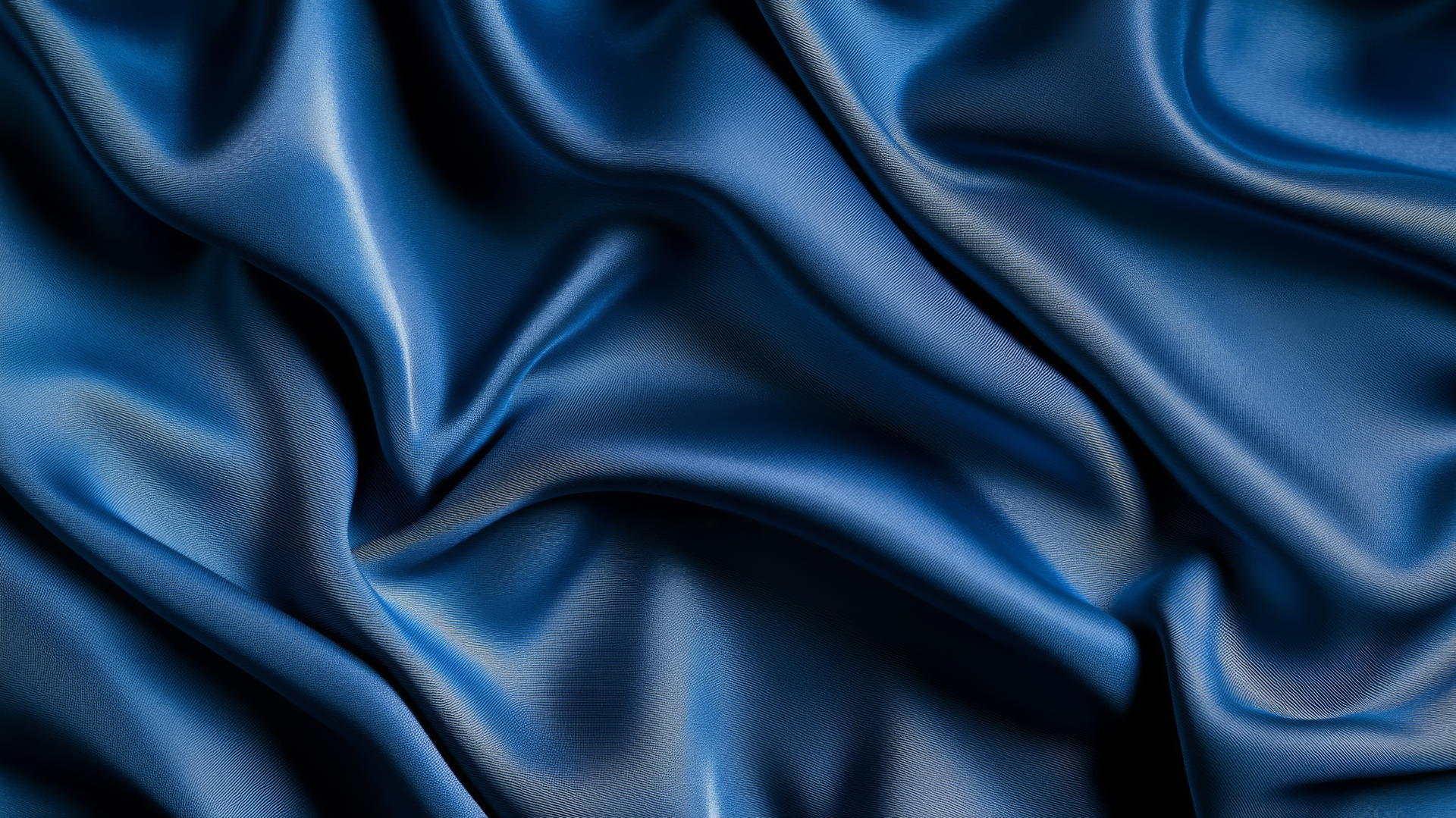 Luxurious blue velvet background with gentle folds