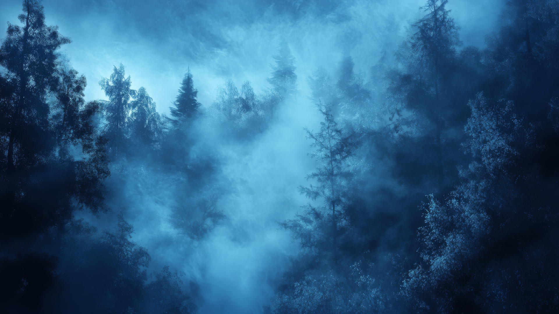 Aesthetic blue wallpaper with ethereal blue fog over forest landscape