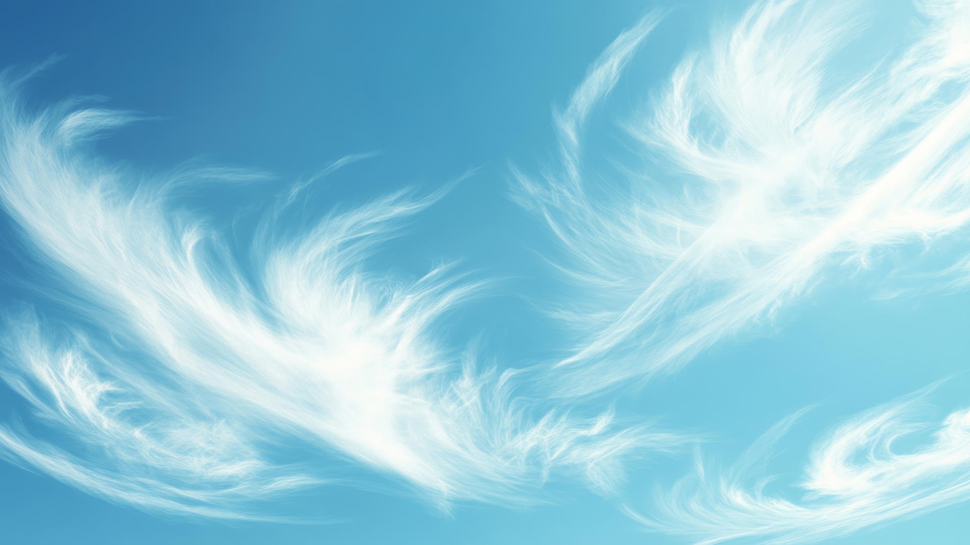 Aesthetic wallpaper blue with a smooth gradient sky and wispy clouds.
