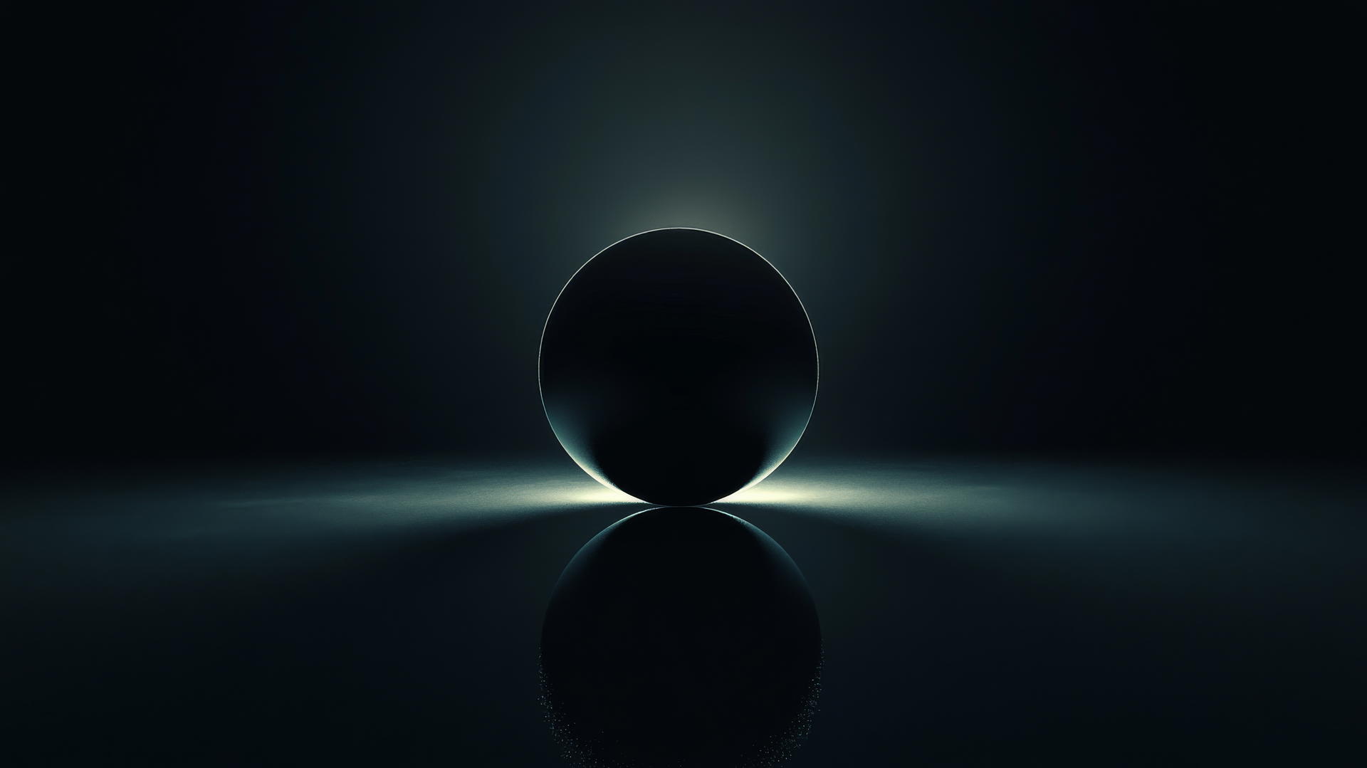 glowing black sphere in dark space with reflected light