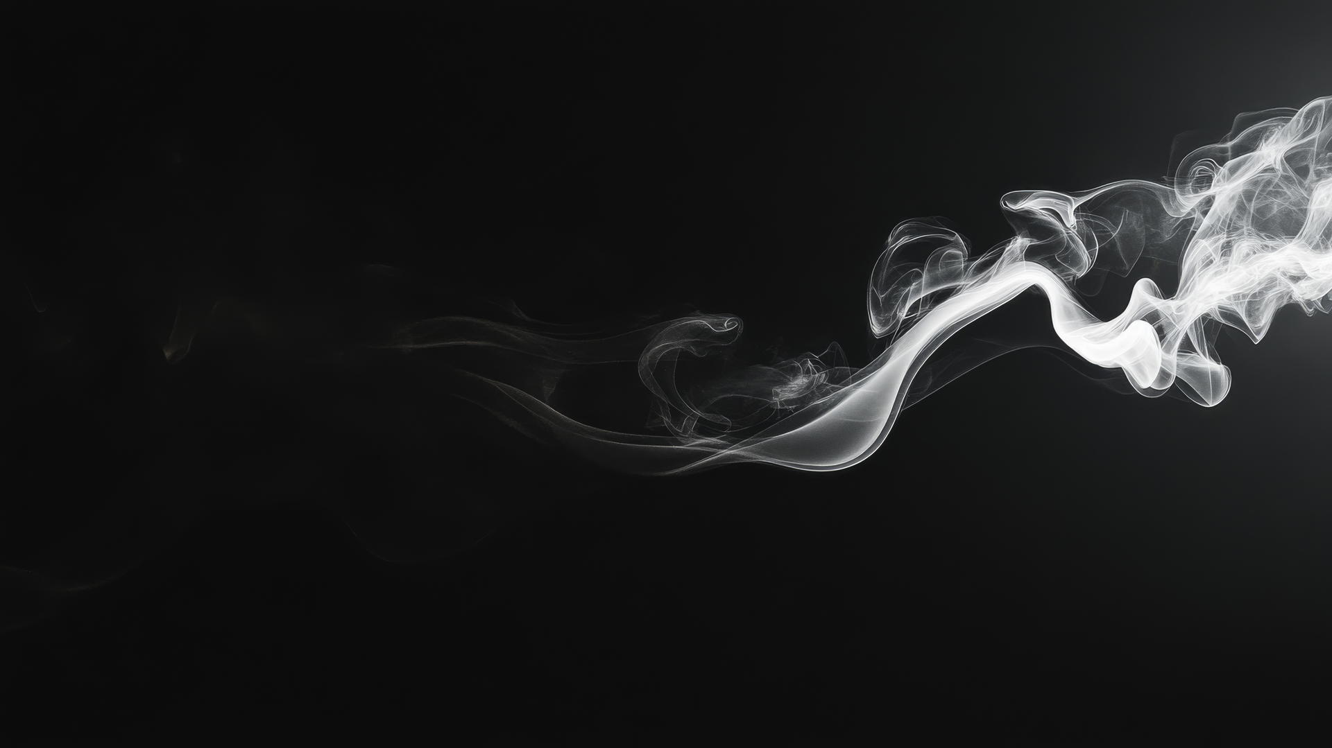 Abstract smoke pattern swirling against a jet-black background, black aesthetic wallpaper