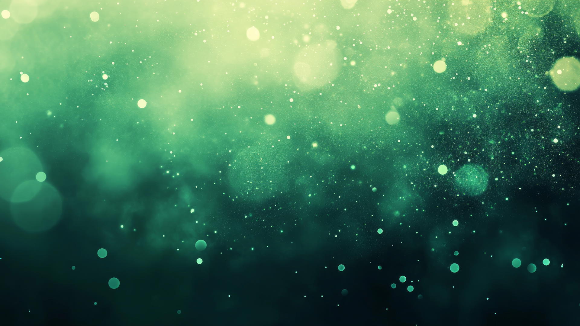 Emerald green wallpaper with gradient and bokeh effects.