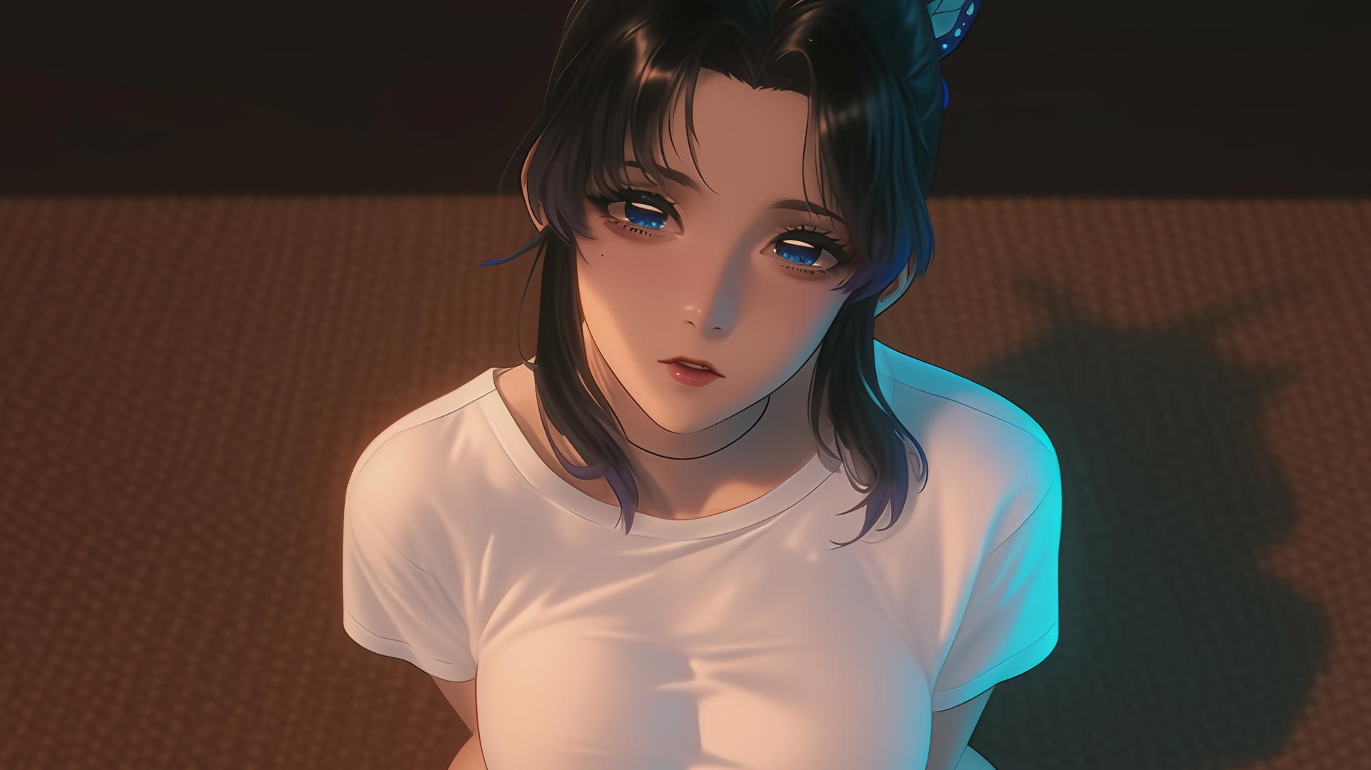 Shinobu Kocho in broken white t-shirt under neon-lit hotel ceiling, looking down.