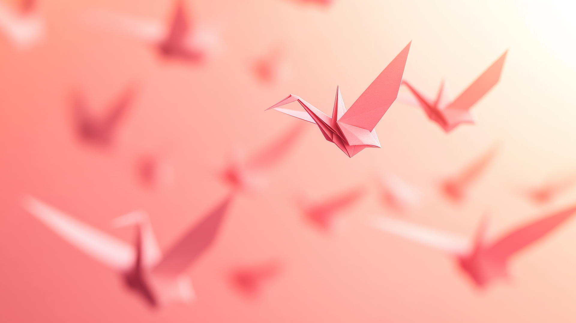 aesthetic pink wallpaper with whimsical floating pink paper cranes