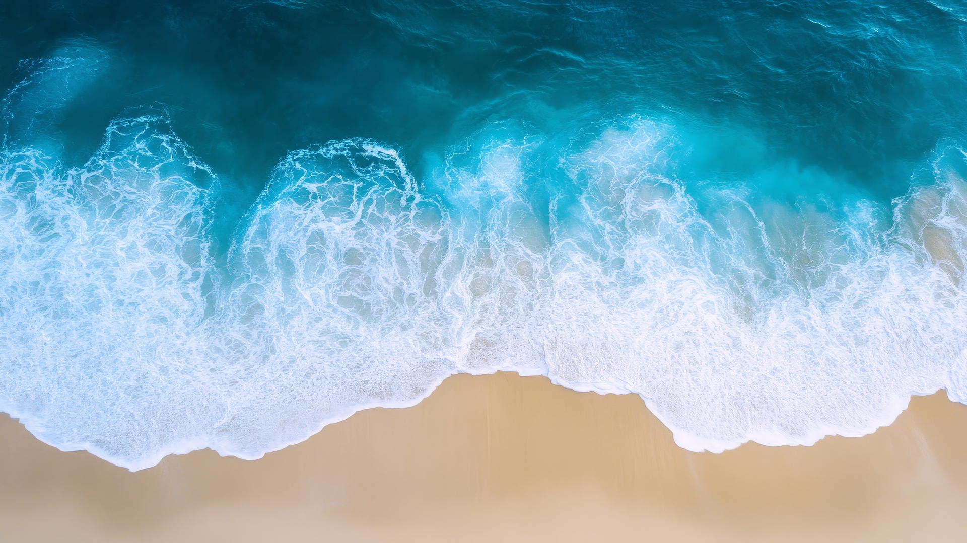 Overhead drone shot of beach pictures wallpaper with white sand and blue ocean