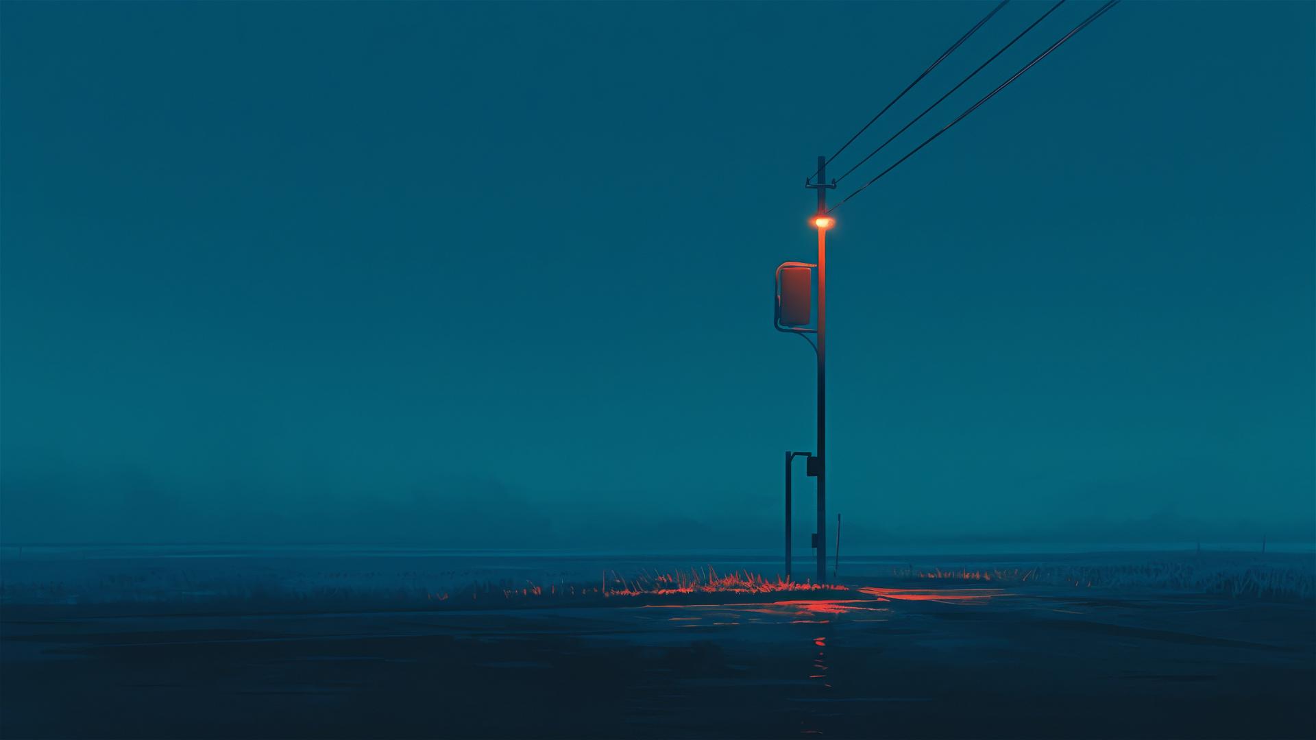 Dim streetlamp flickering on a dark, empty street