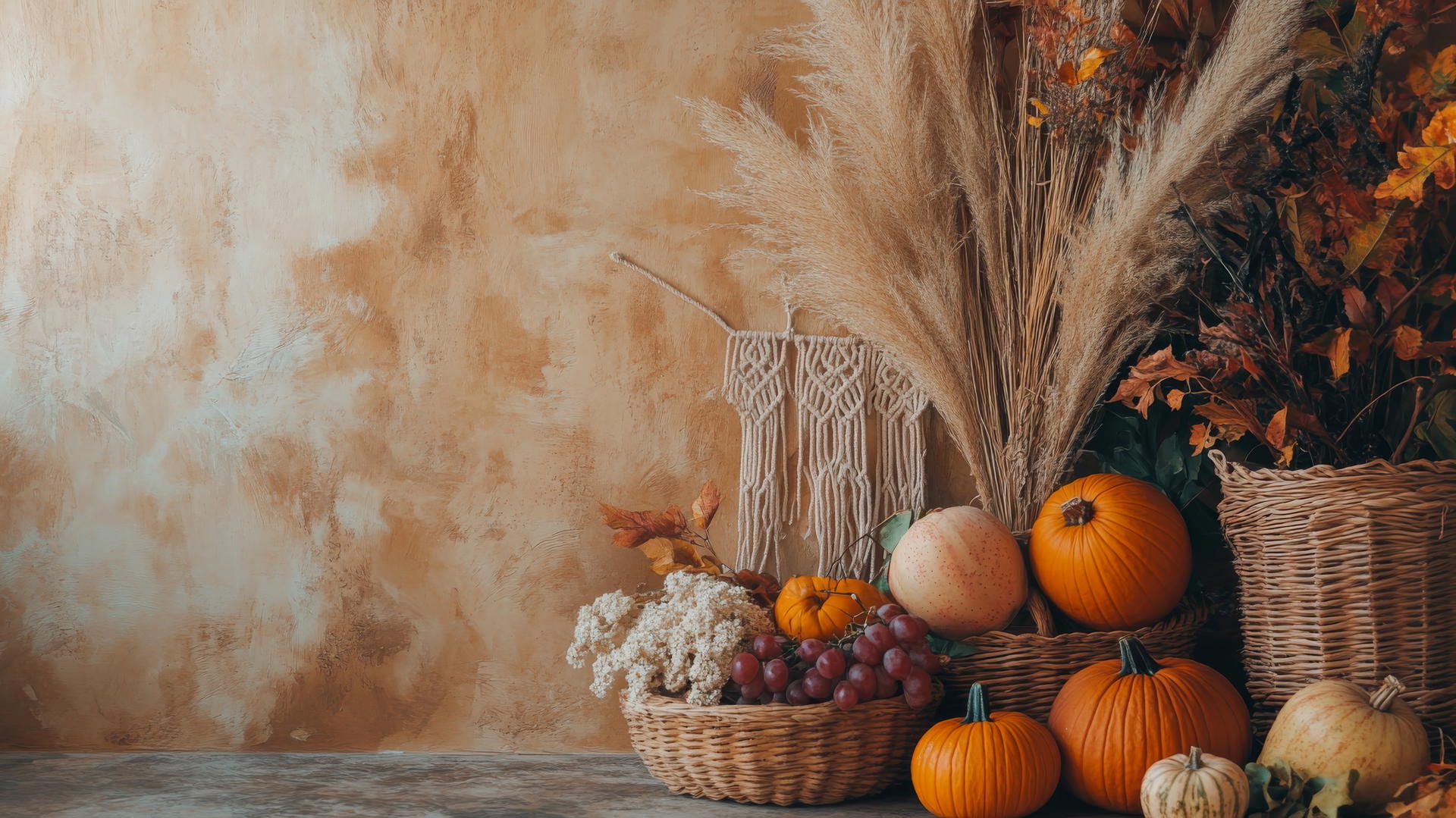 thanksgiving wallpaper aesthetic with macramé, dried pampas grass, and fruits