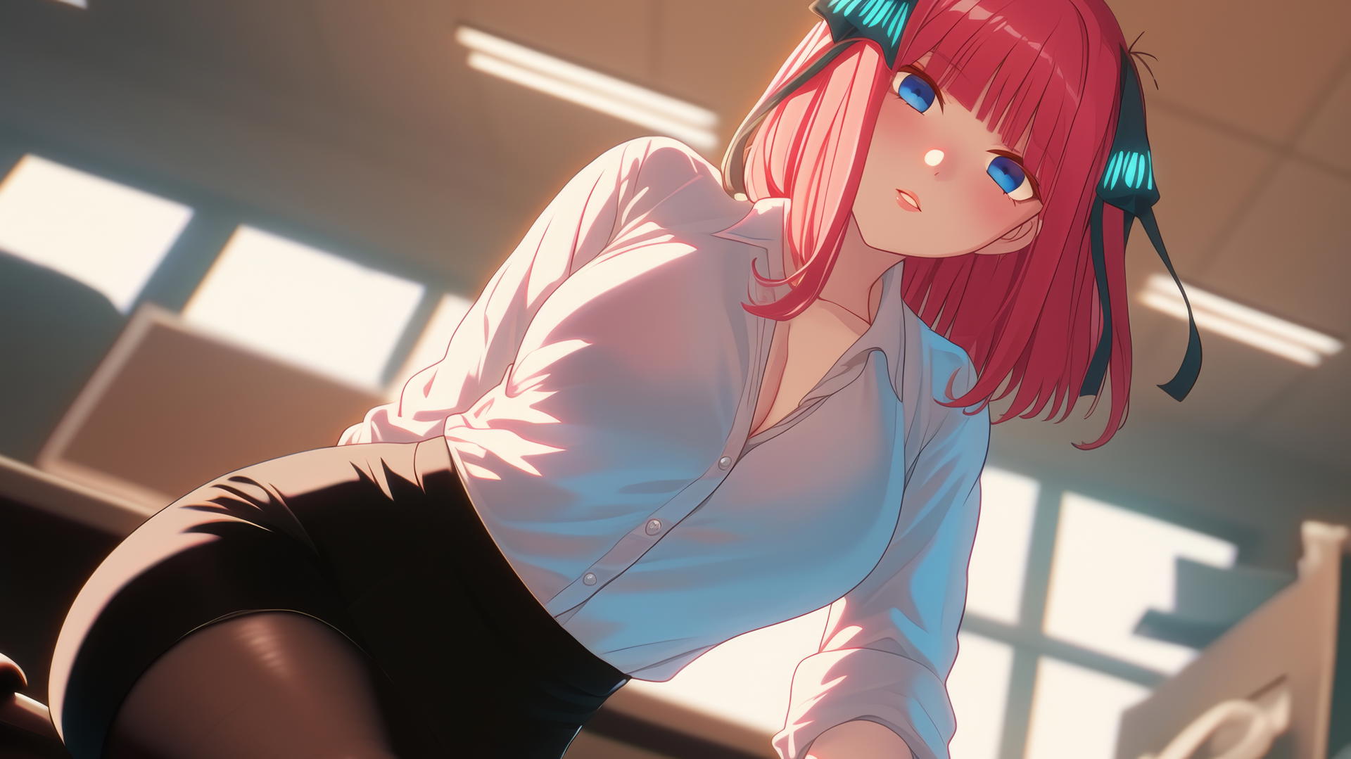 Nino Nakano kneeling in office shirt with warm light and ceiling backdrop.