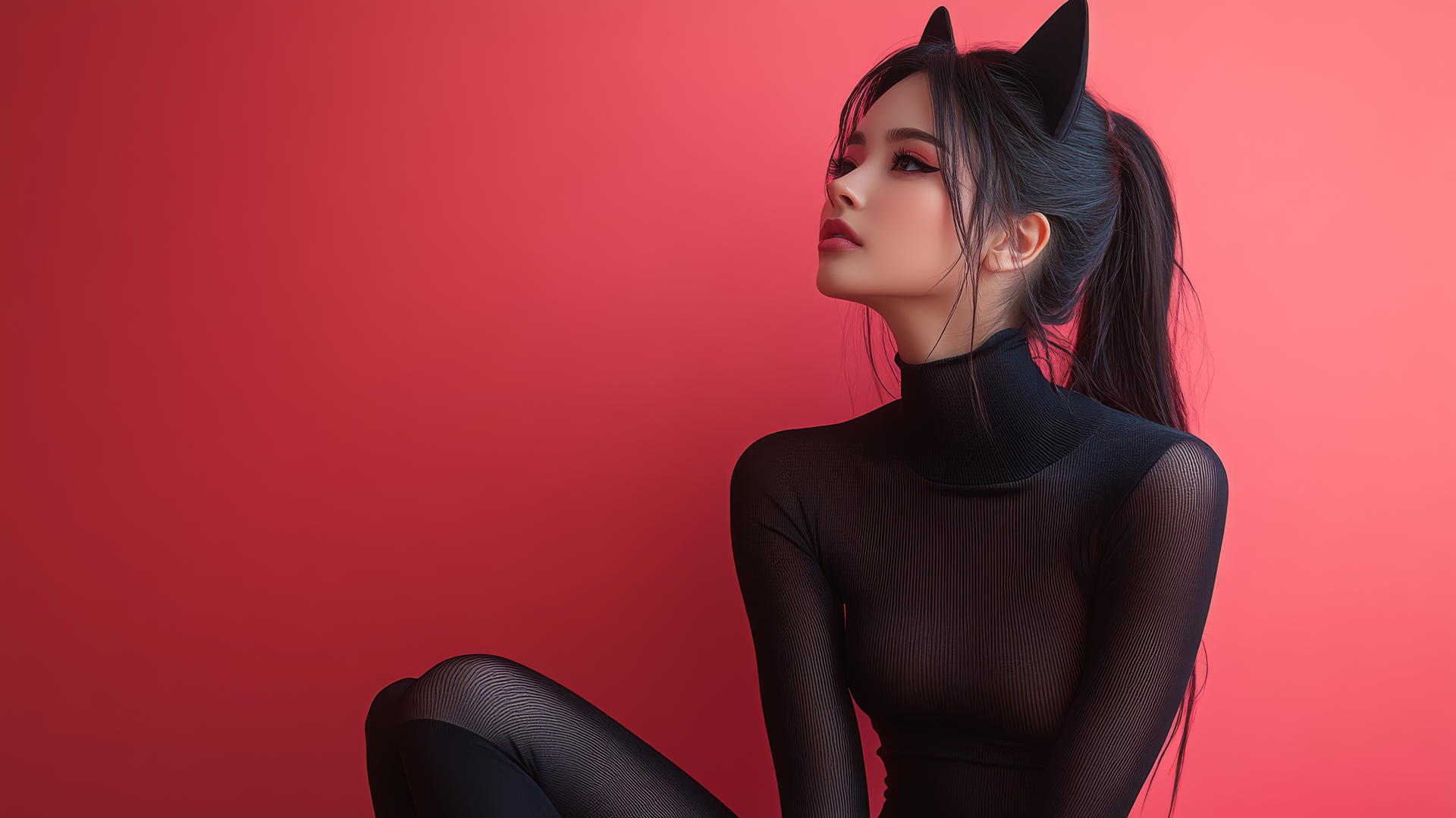 Asian girl with cat ears, in high heels and long sleeves, sitting cross-legged, side view.