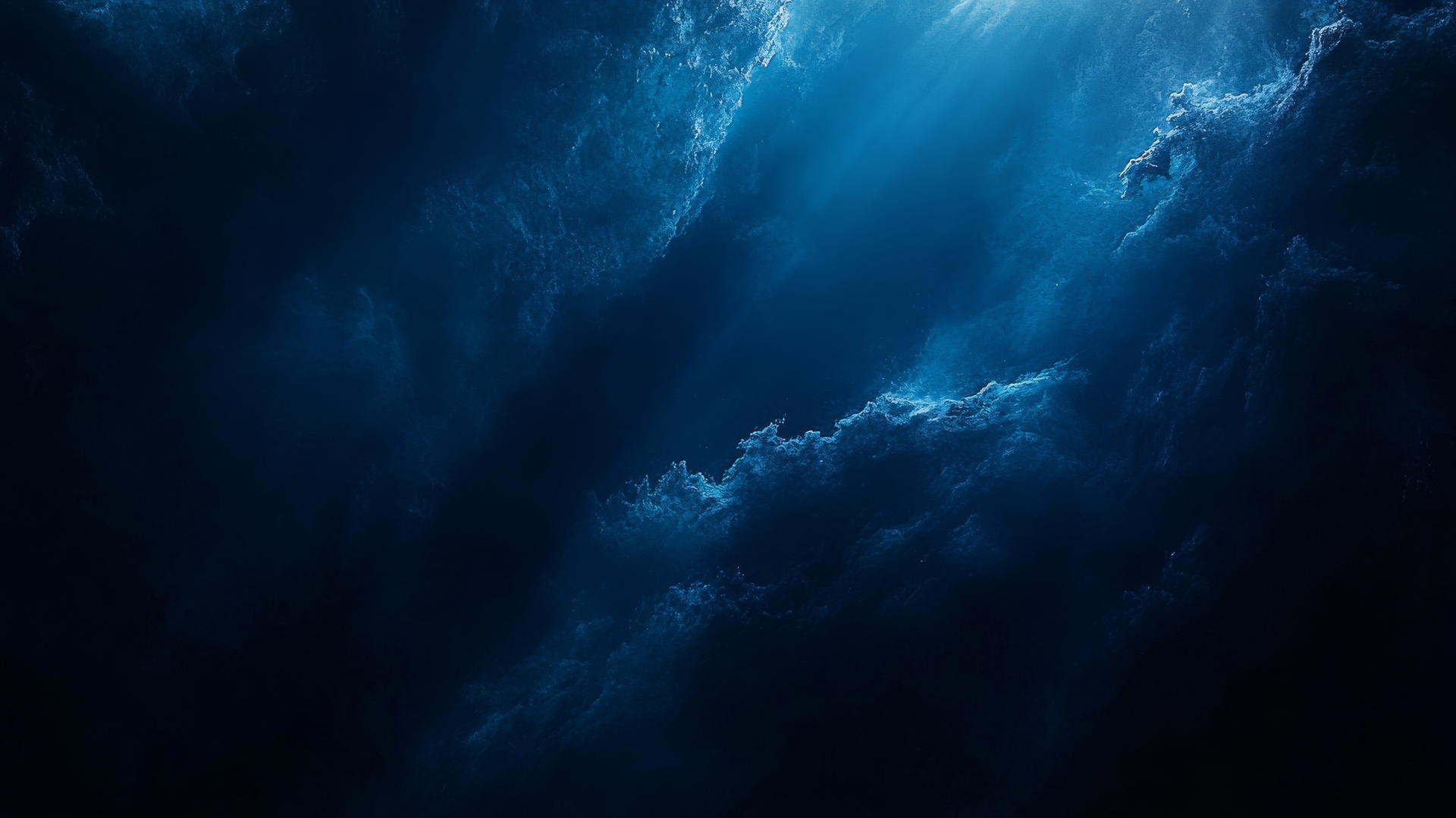 dark blue aesthetic wallpaper with deep ocean abyss and light rays