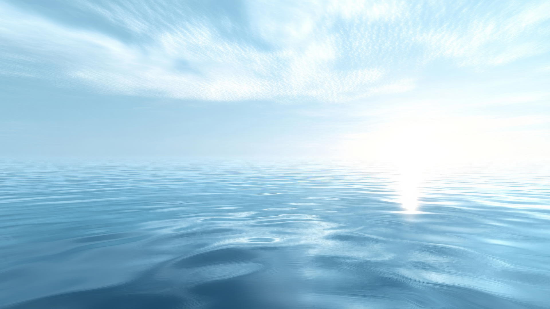 light blue wallpaper with gentle ripples on a clear body of water